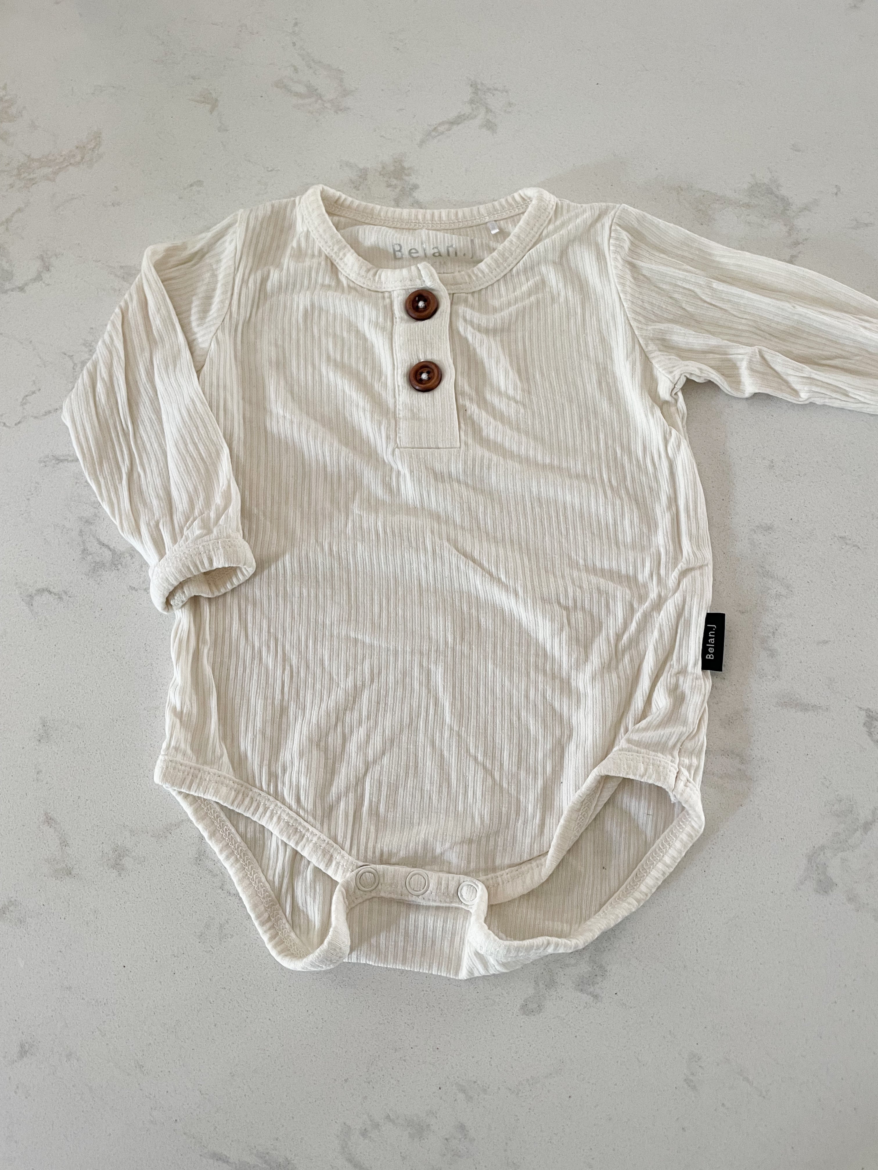 Belan.J- 3-6 months- cream coloured ribbed bamboo bodysuit
