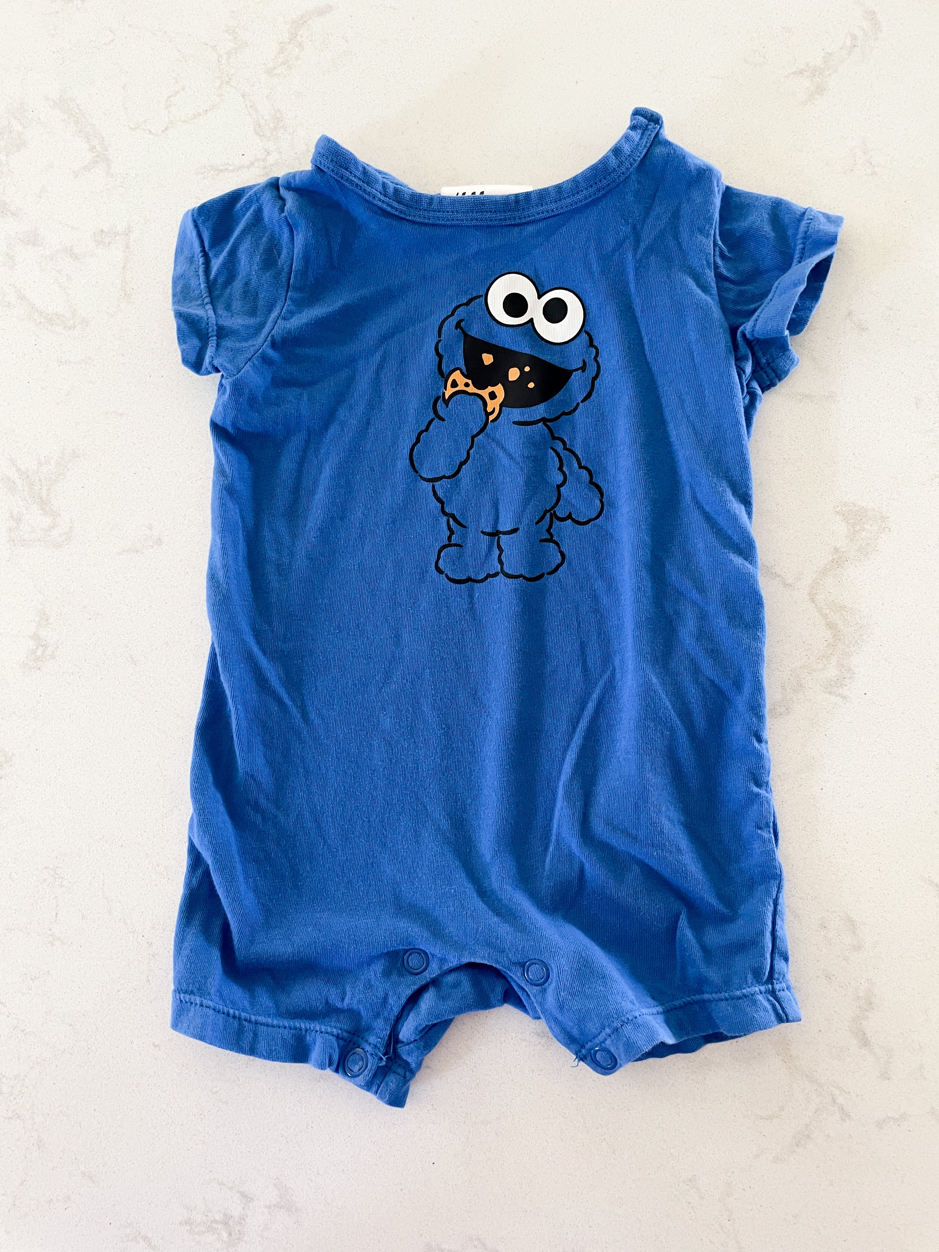 H&M- Newborn- royal blue shorts Cookie Monster romper