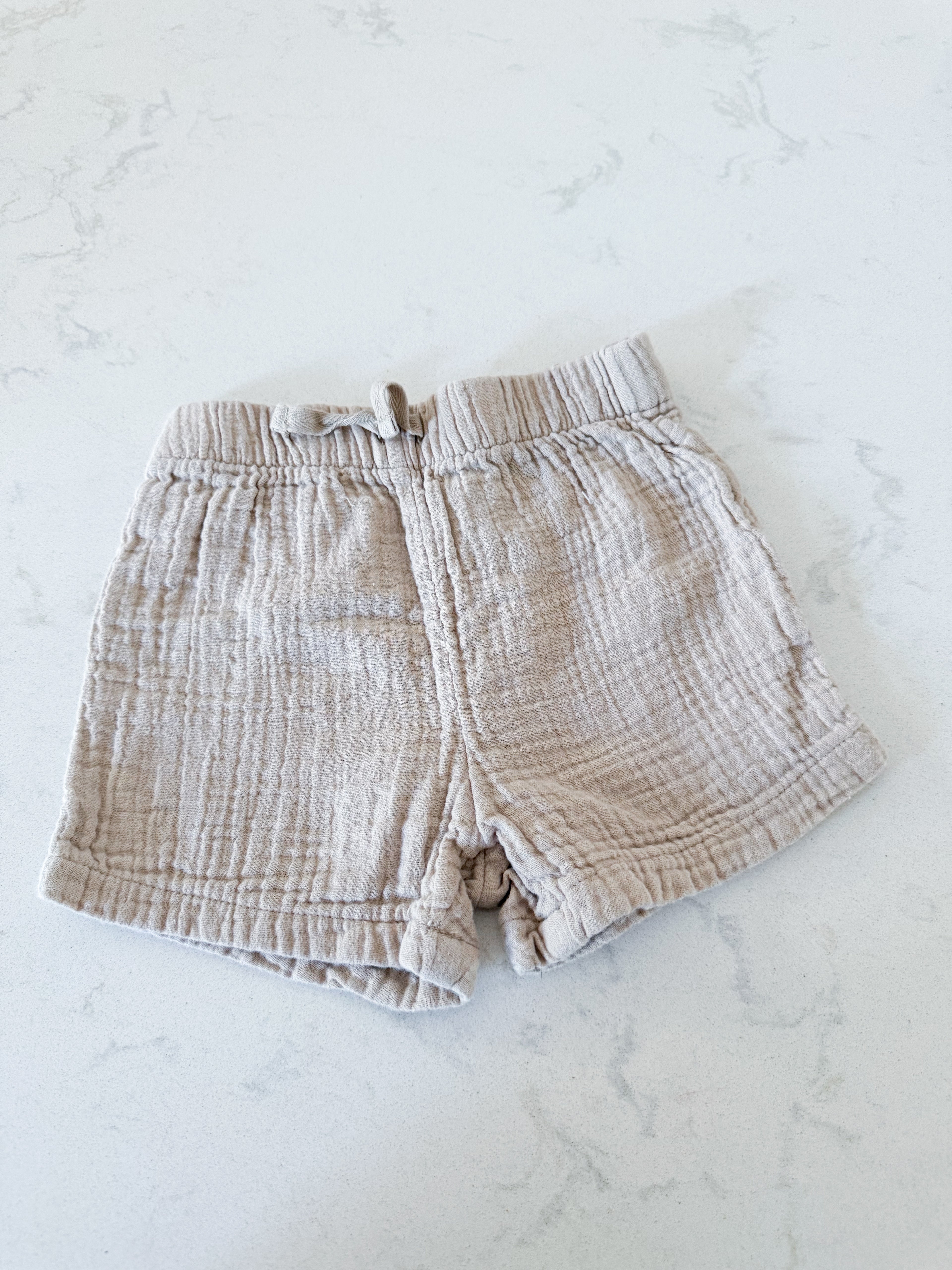 George- 12-18m- GUC- beige muslin shorts