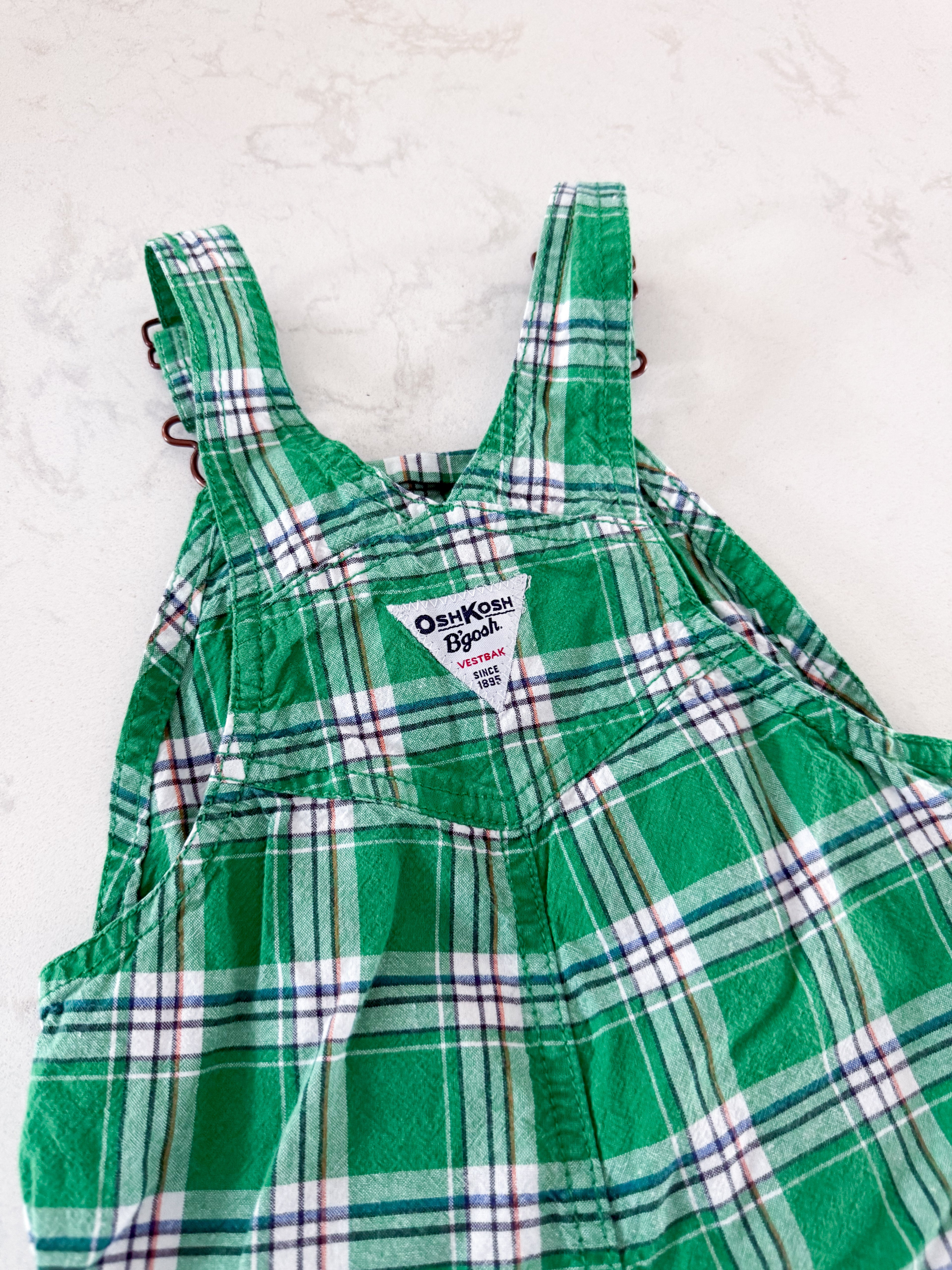 Oshkosh (2004)- 18m- GUC- green plaid short overalls