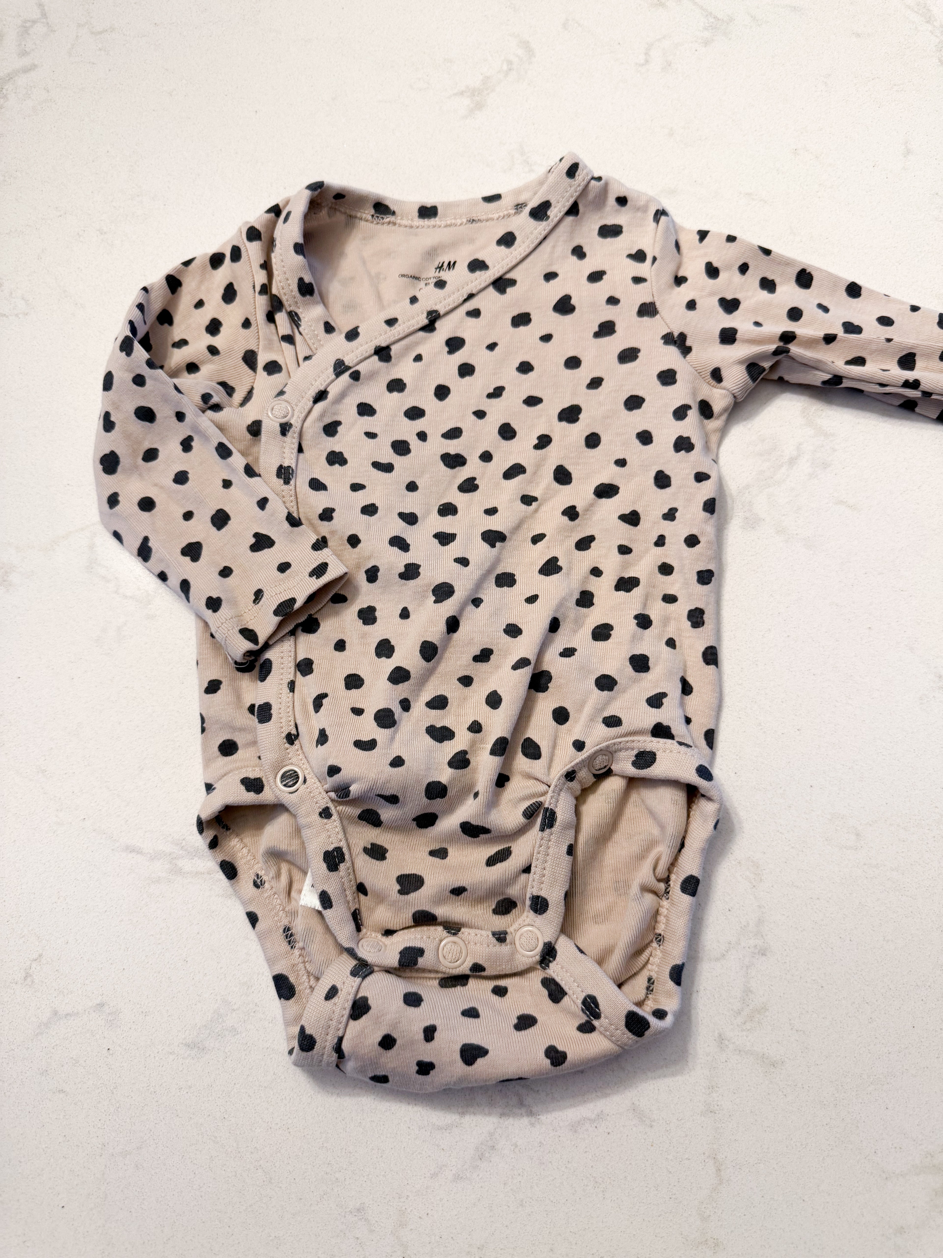 H&M- 3m- VGUC- beige with black polka dot wrap bodysuit