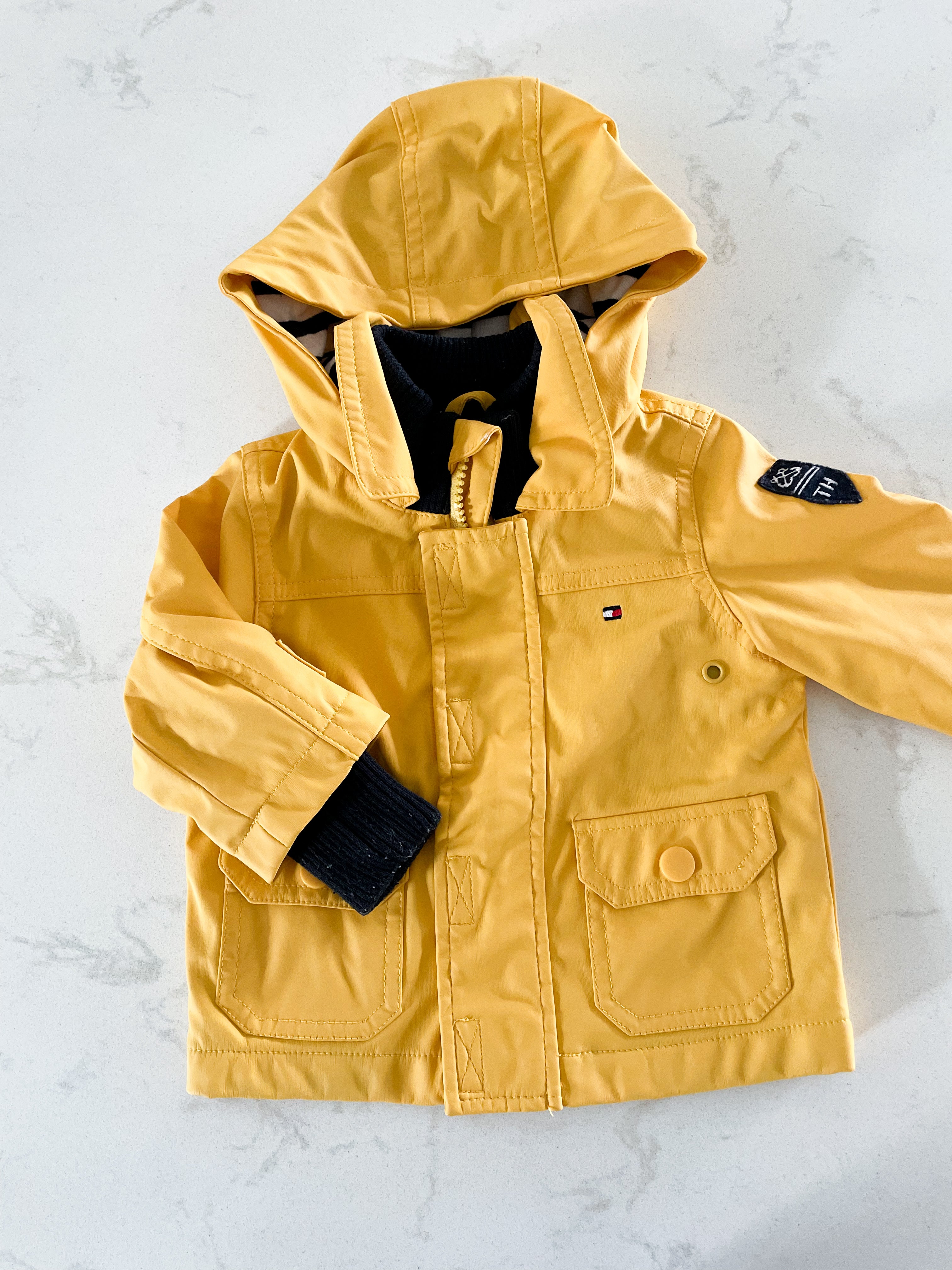 Tommy Hilfiger- 6-9m- GUC- yellow rain coat. Cotton lined