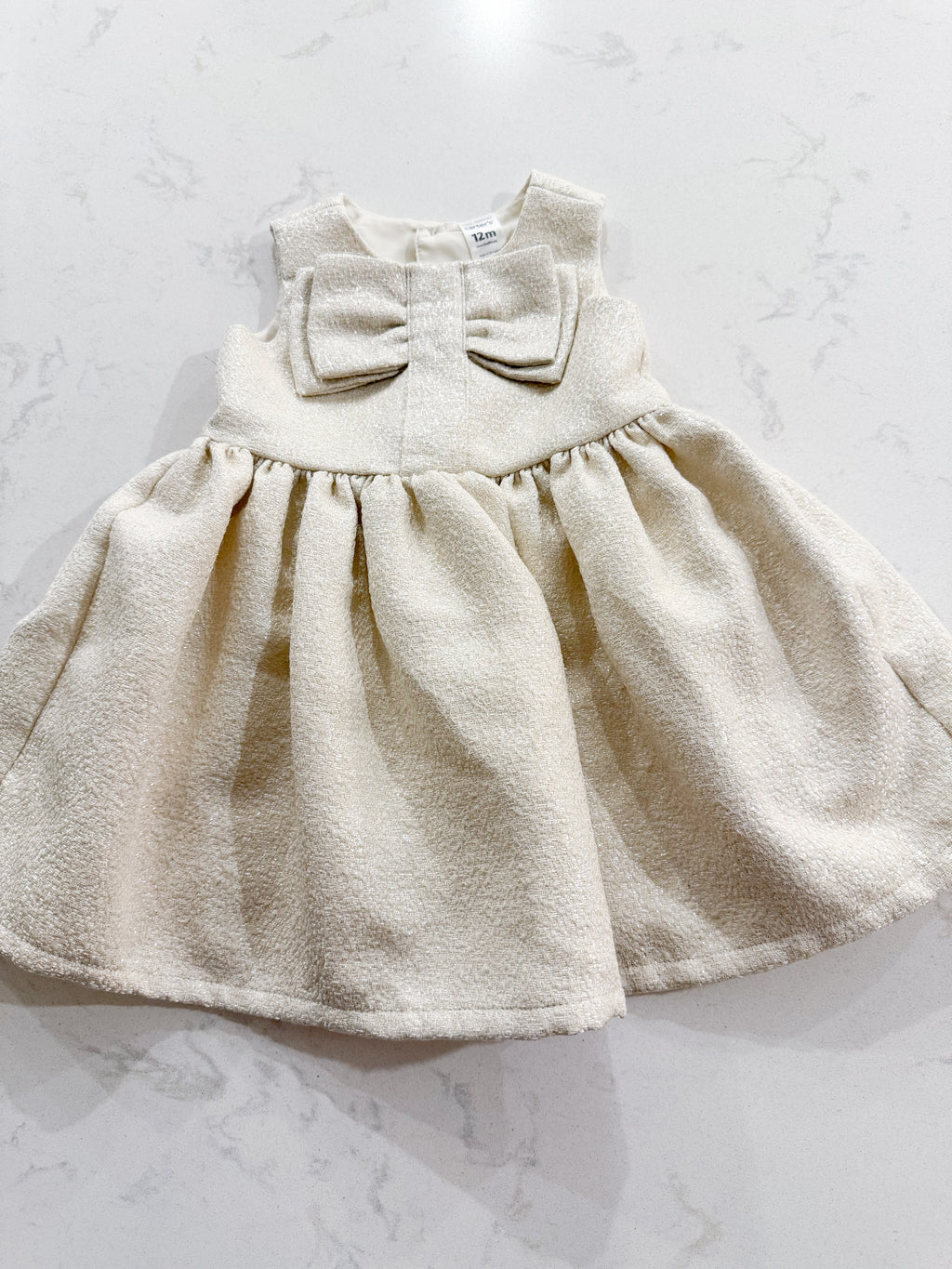 Carter’s- 12m- VGUC- white and gold sparkle dress with bow on chest