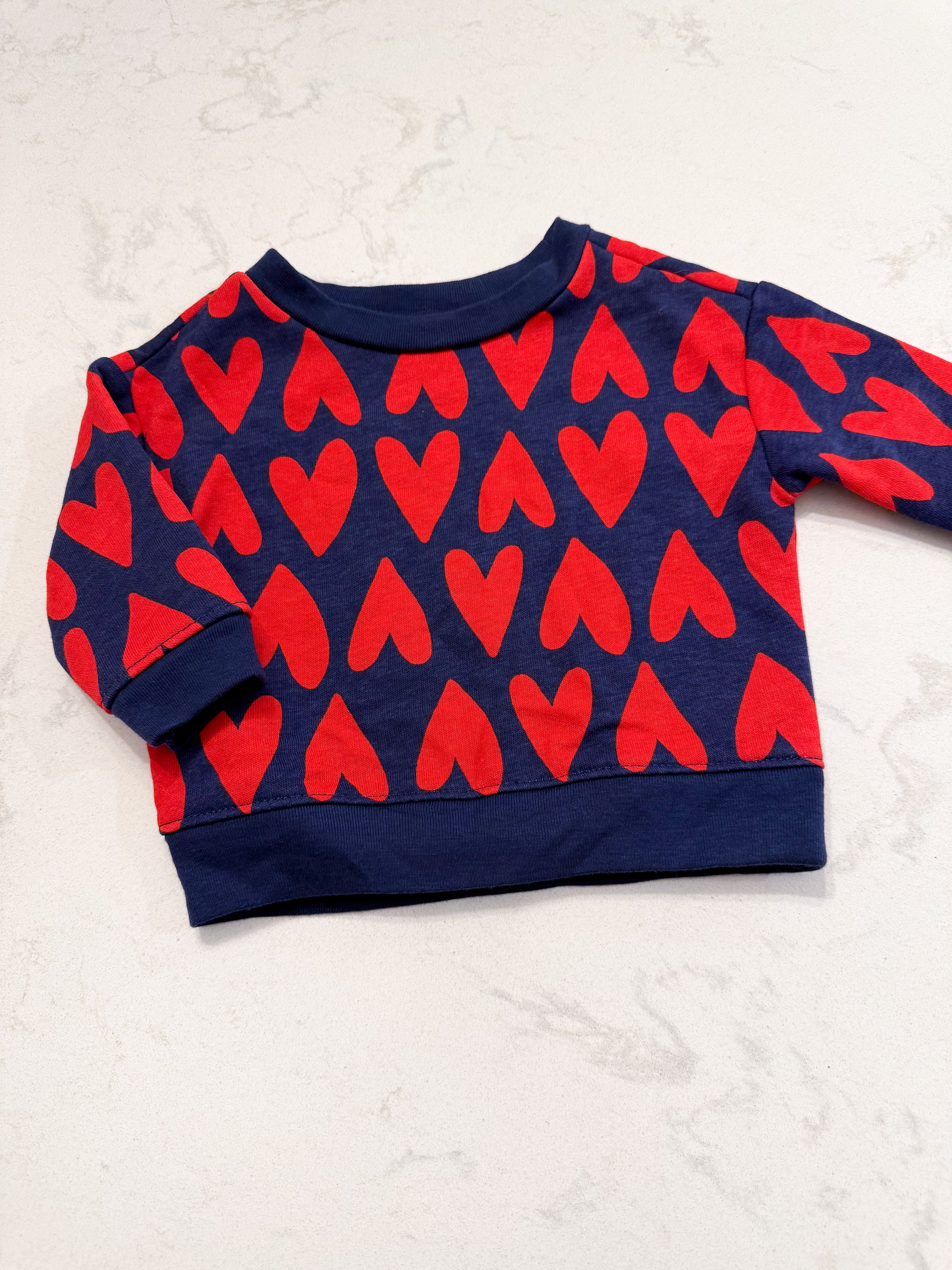 Old Navy- 0-3m- VGUC- navy crewneck with red hearts