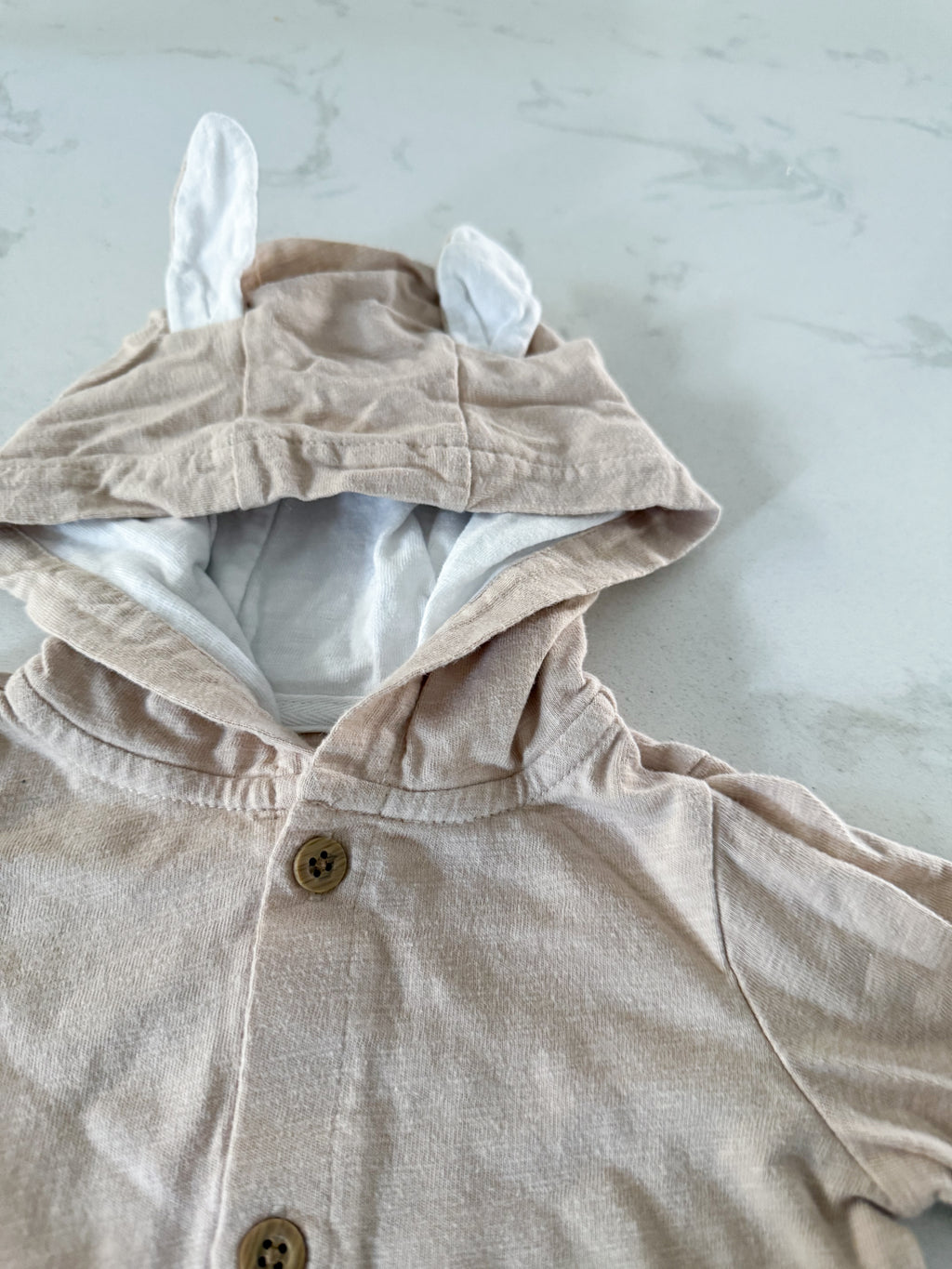 Carter’s- 9m- GUC- beige button up hooded romper with ears
