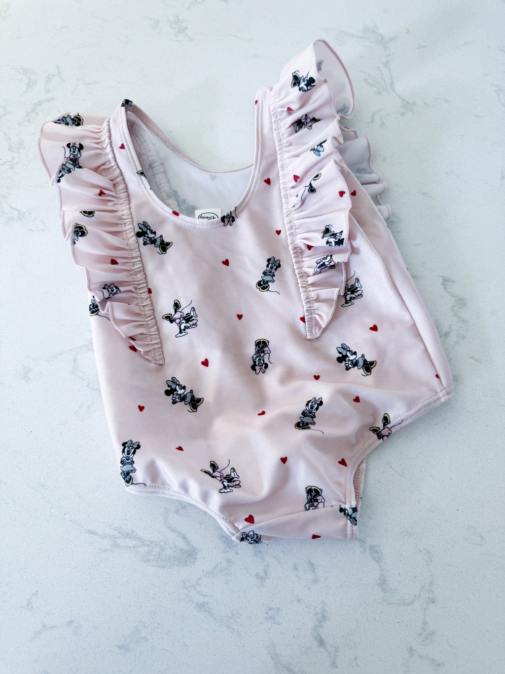 H&M- 9-12m- VGUC- light pink ruffle one piece swim suit with Minnie Mouse
