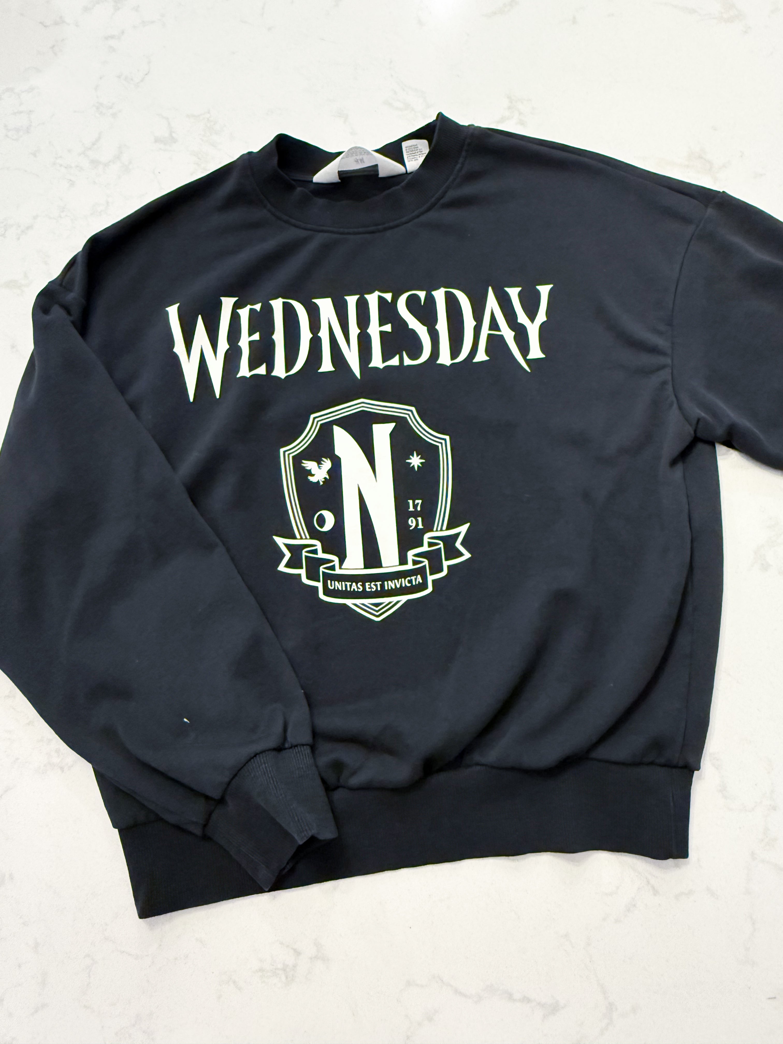 H&M- 12/14Y- VGUC- black crew neck sweater with Wednesday graphic