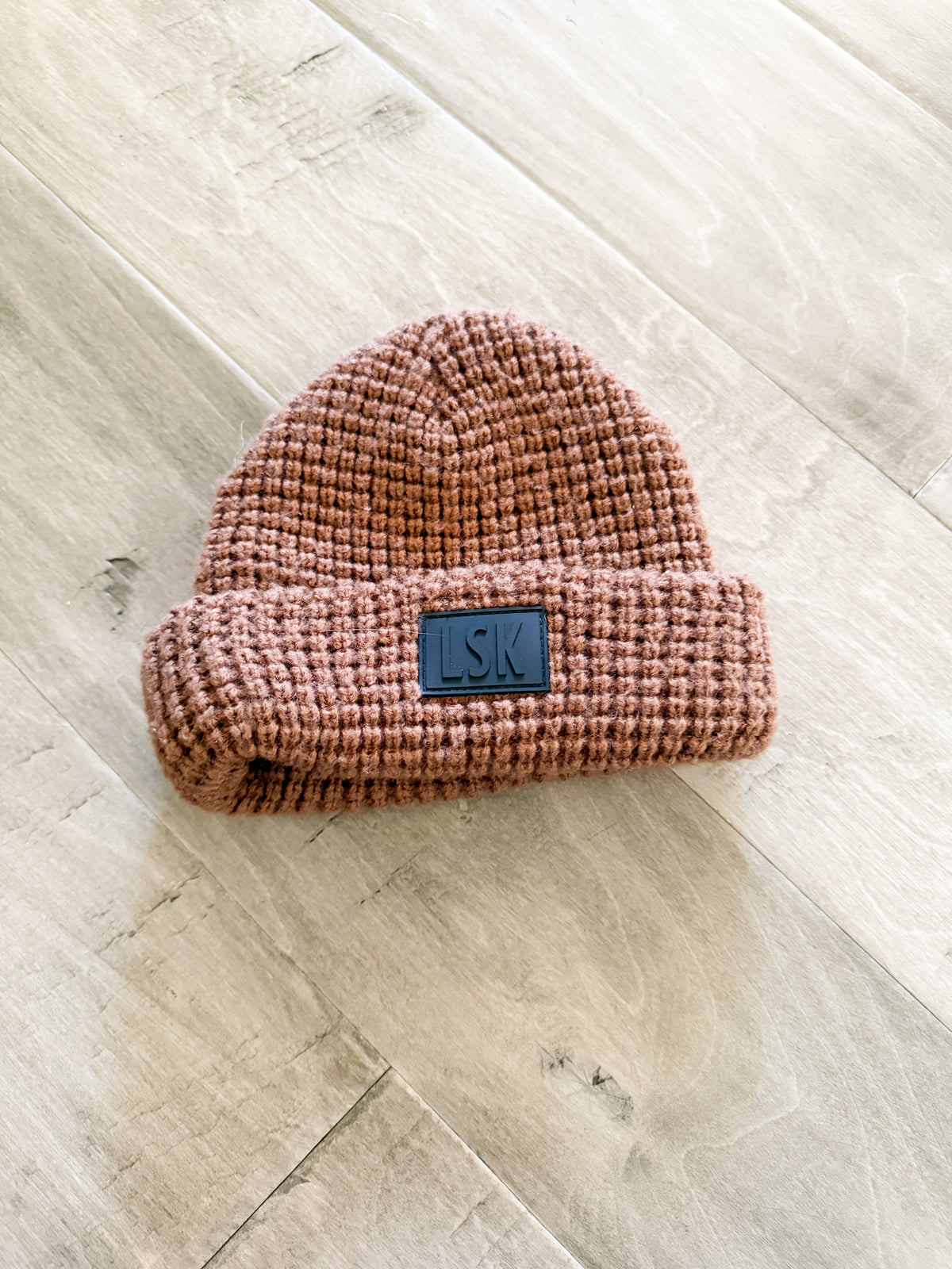 Love Squared- no size (infant 3-6m)- GUC- LSK Brown knit hat with black logo on brim