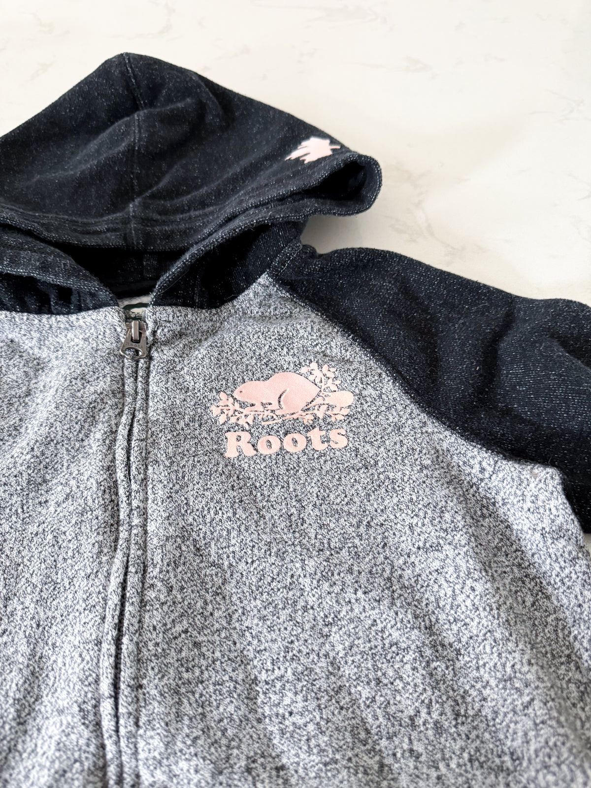 Roots- 9-10Y- VGUC- Grey and black speckled zip up hoodie with pink logo