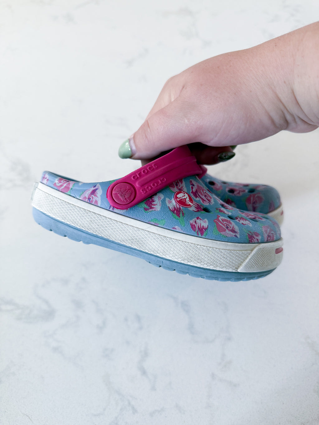 Crocs- 6/7C- GUC- light blue with pink florals slip on crocs