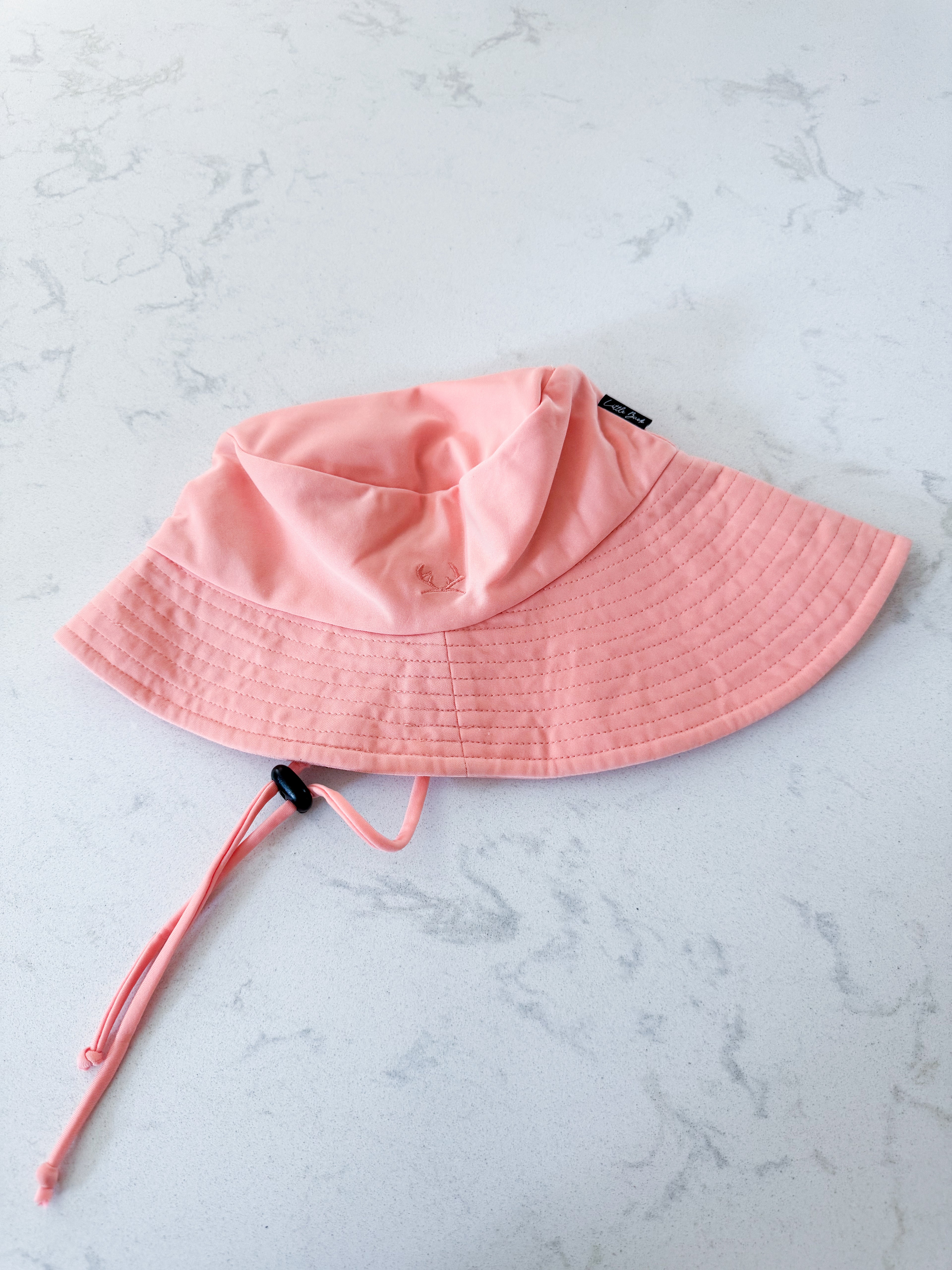Little Buck- medium (18m-3Y)- VGUC- light orange swim hat with strap