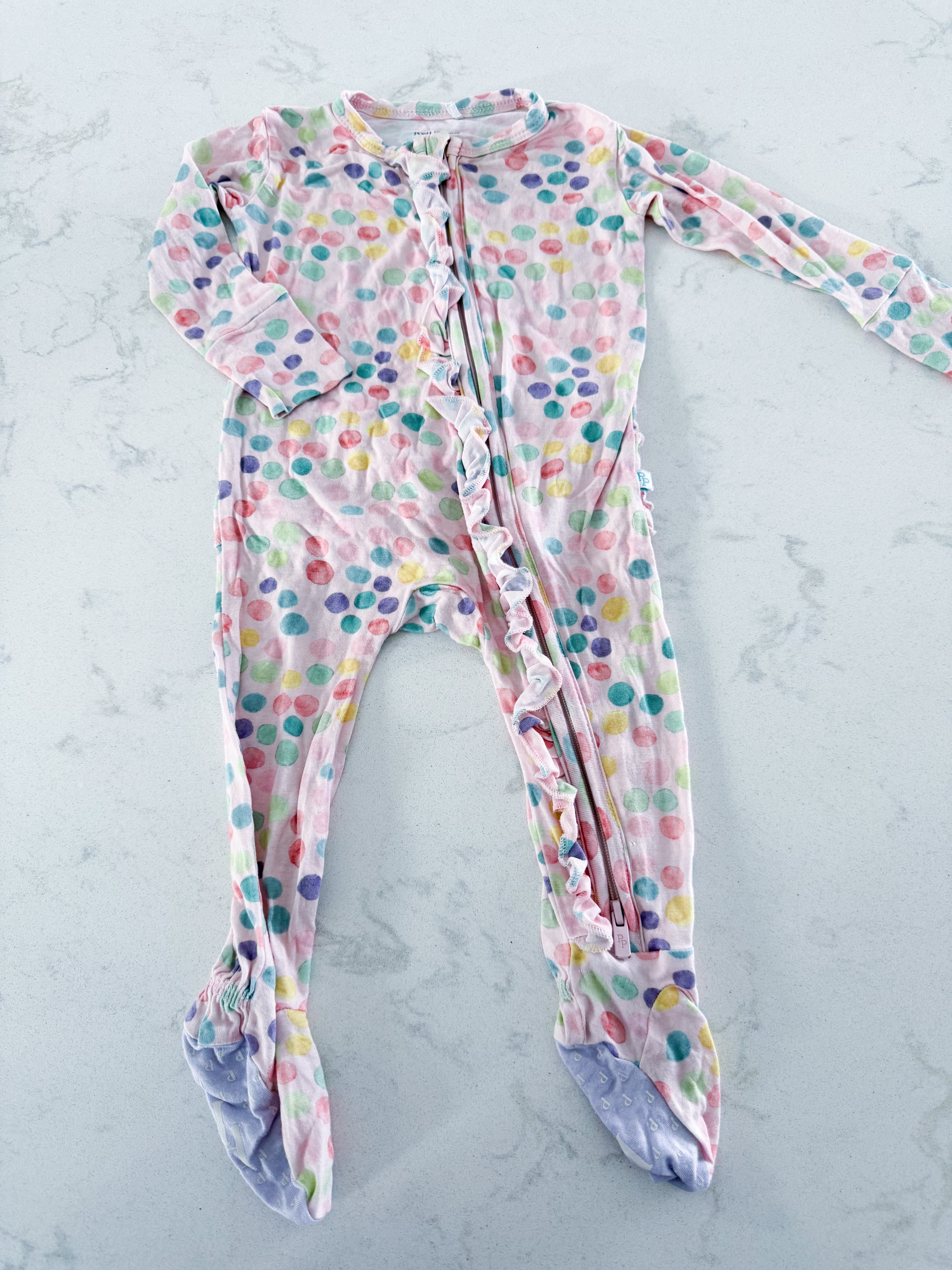 Posh Peanut- 3-6m- VGUC- pink footie bamboo jammies with rainbow dots and rufffle bum
