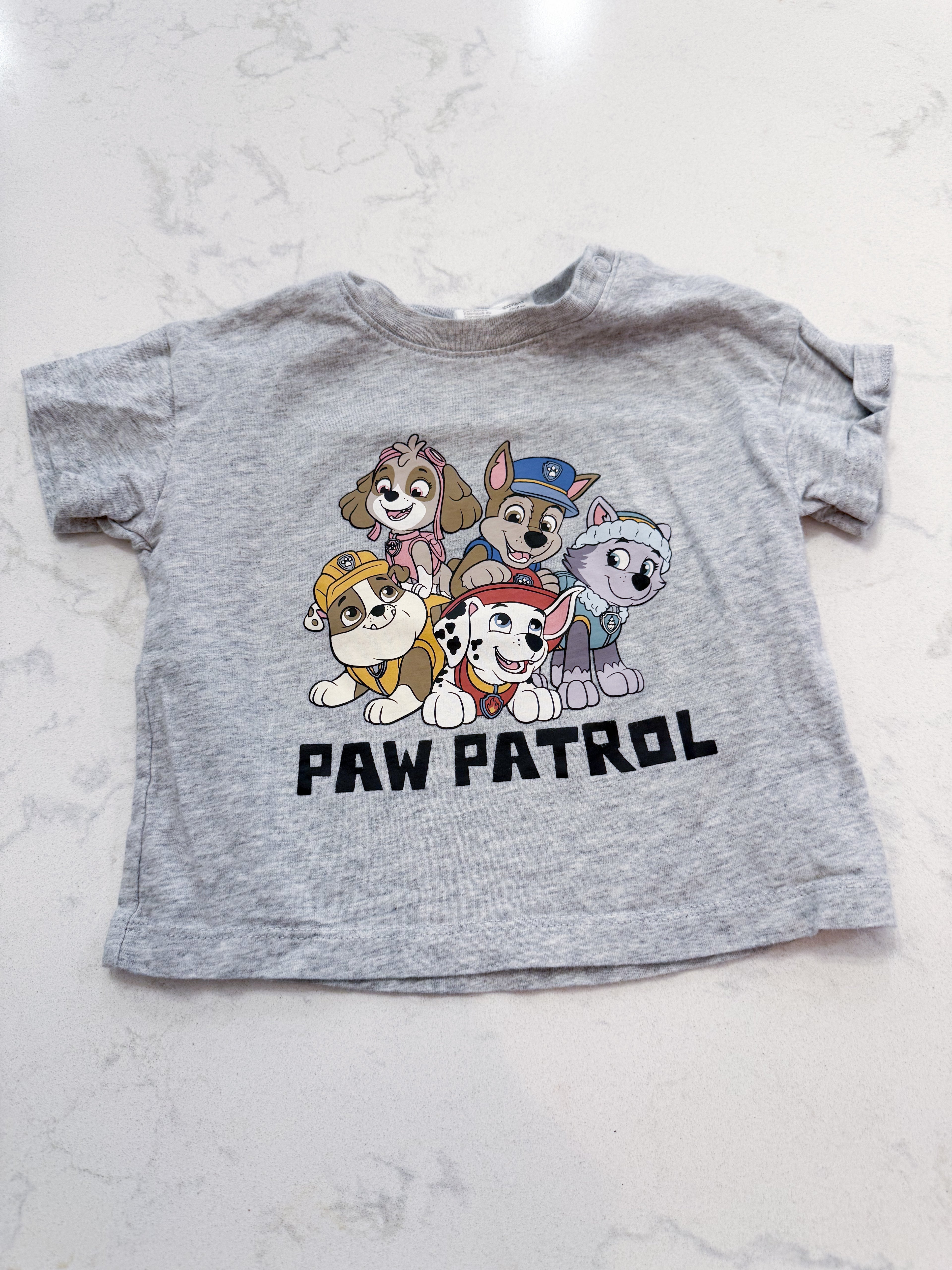 H&M- 6-9m- VGUC- light grey t shirt with paw patrol pups