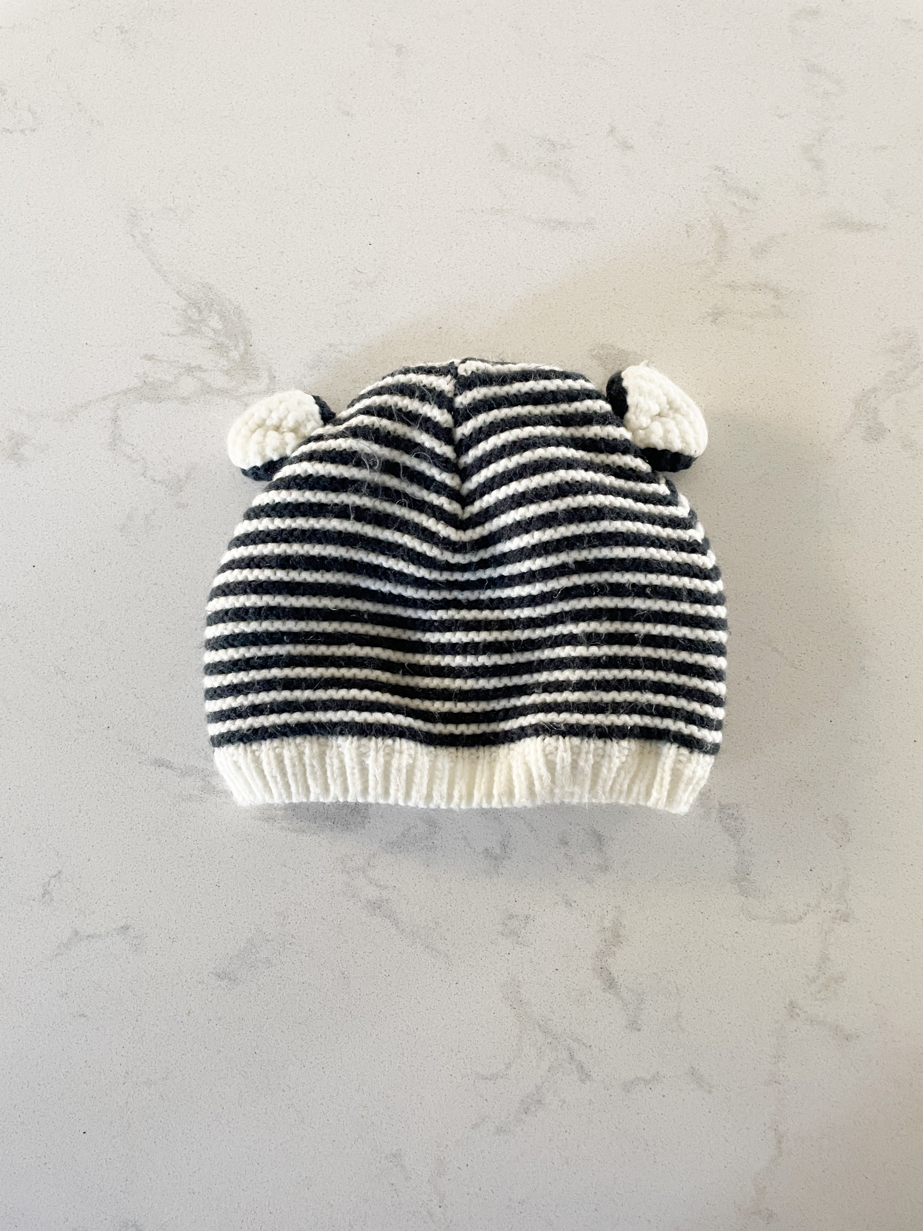Carter’s-0-3m- GUC- white and black striped with bear ears