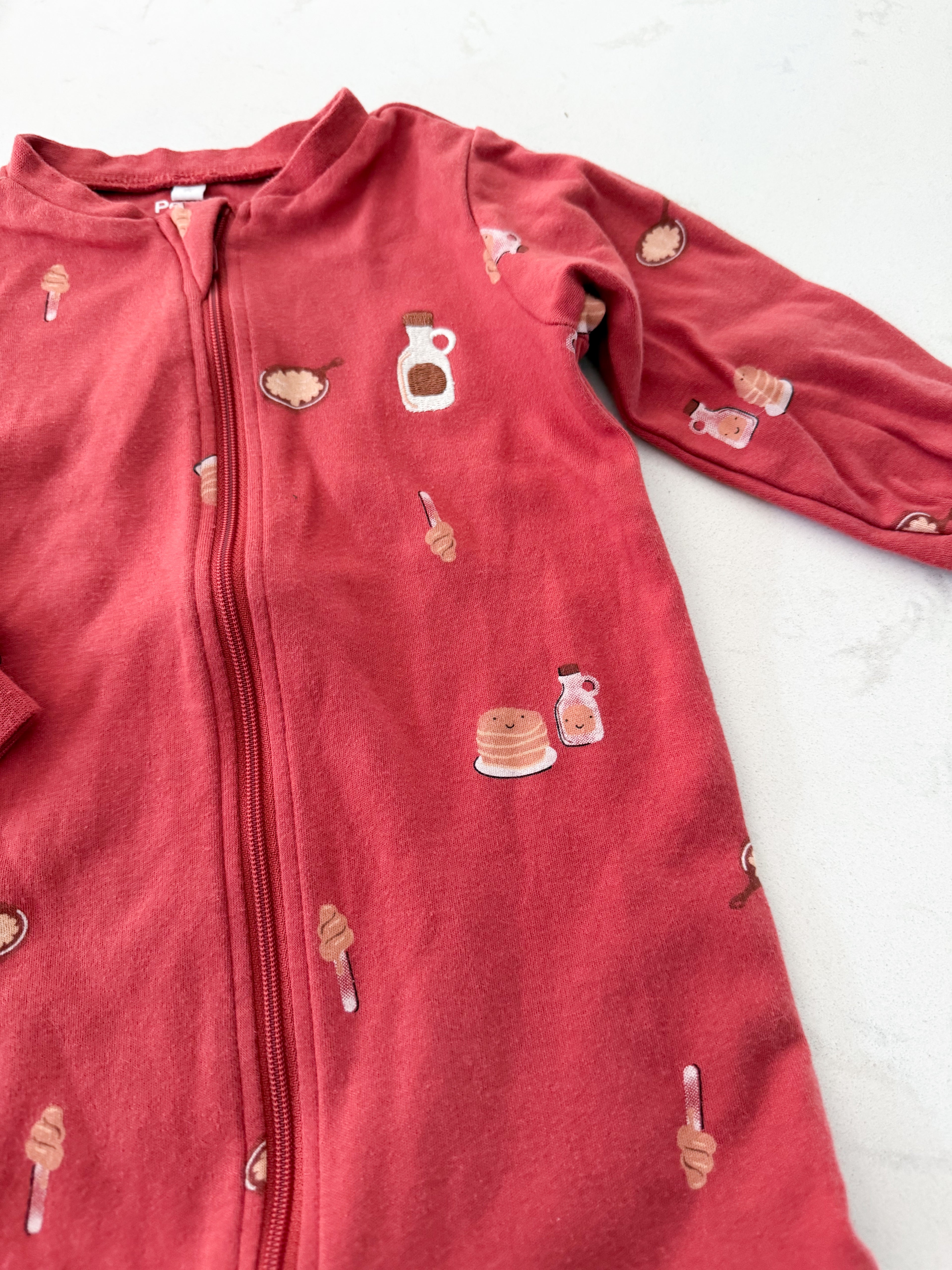 Pekkle- 18m- GUC- reddish footie pajamas with embroidered maple syrup