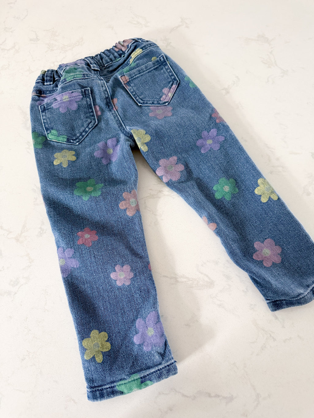 Garanimals- 3T- VGUC- blue jeans with multicoloured flowers