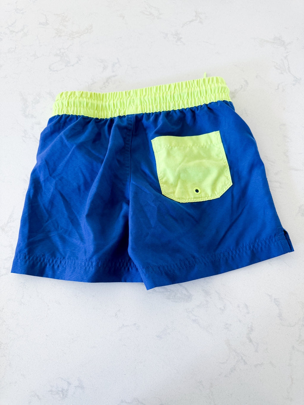 Old Navy- 6-7Y- VGUC- blue and neon green swim trunks with popsicle