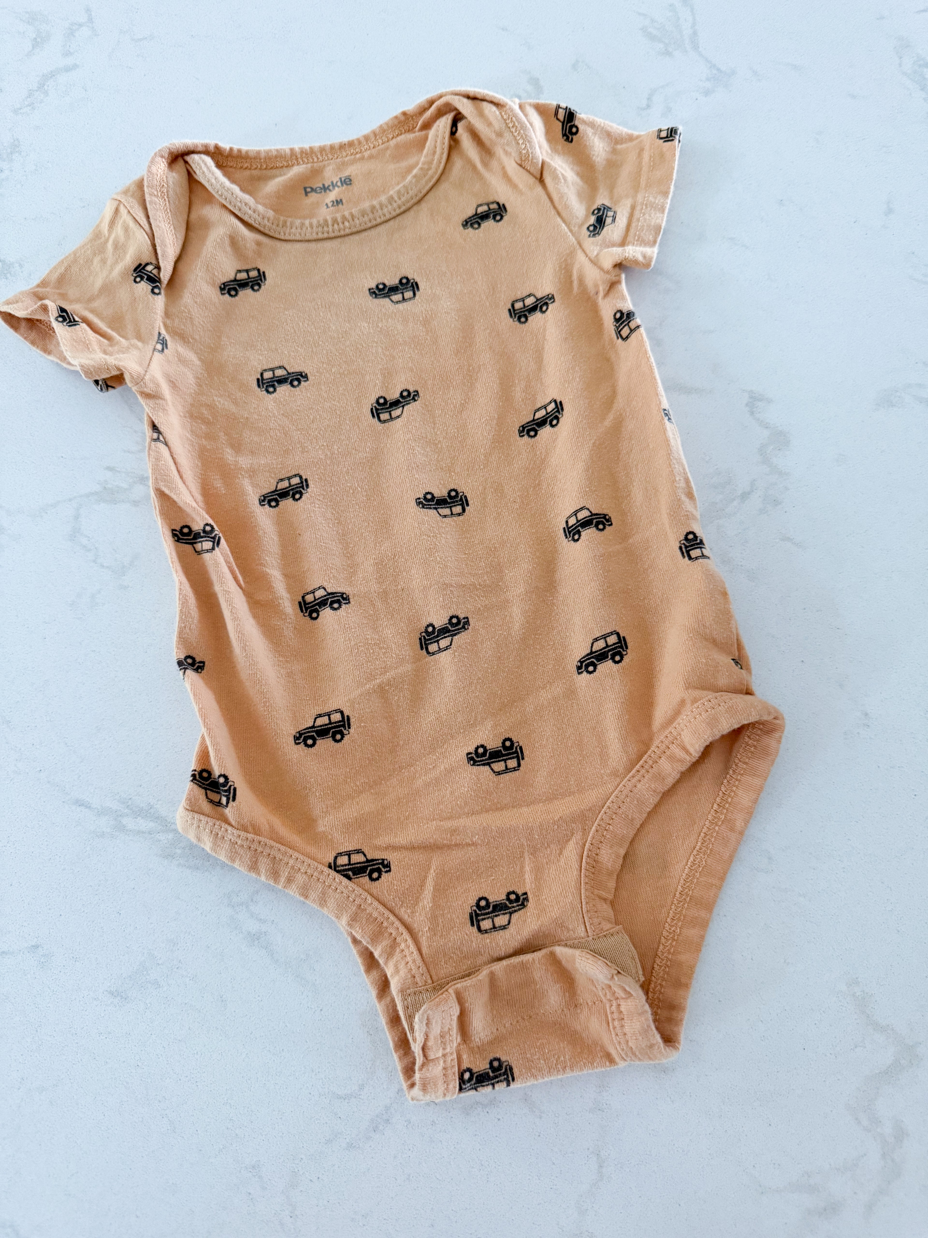 Pekkle- 12m- GUC- dark yellowish tan short sleeve bodysuit with little jeeps