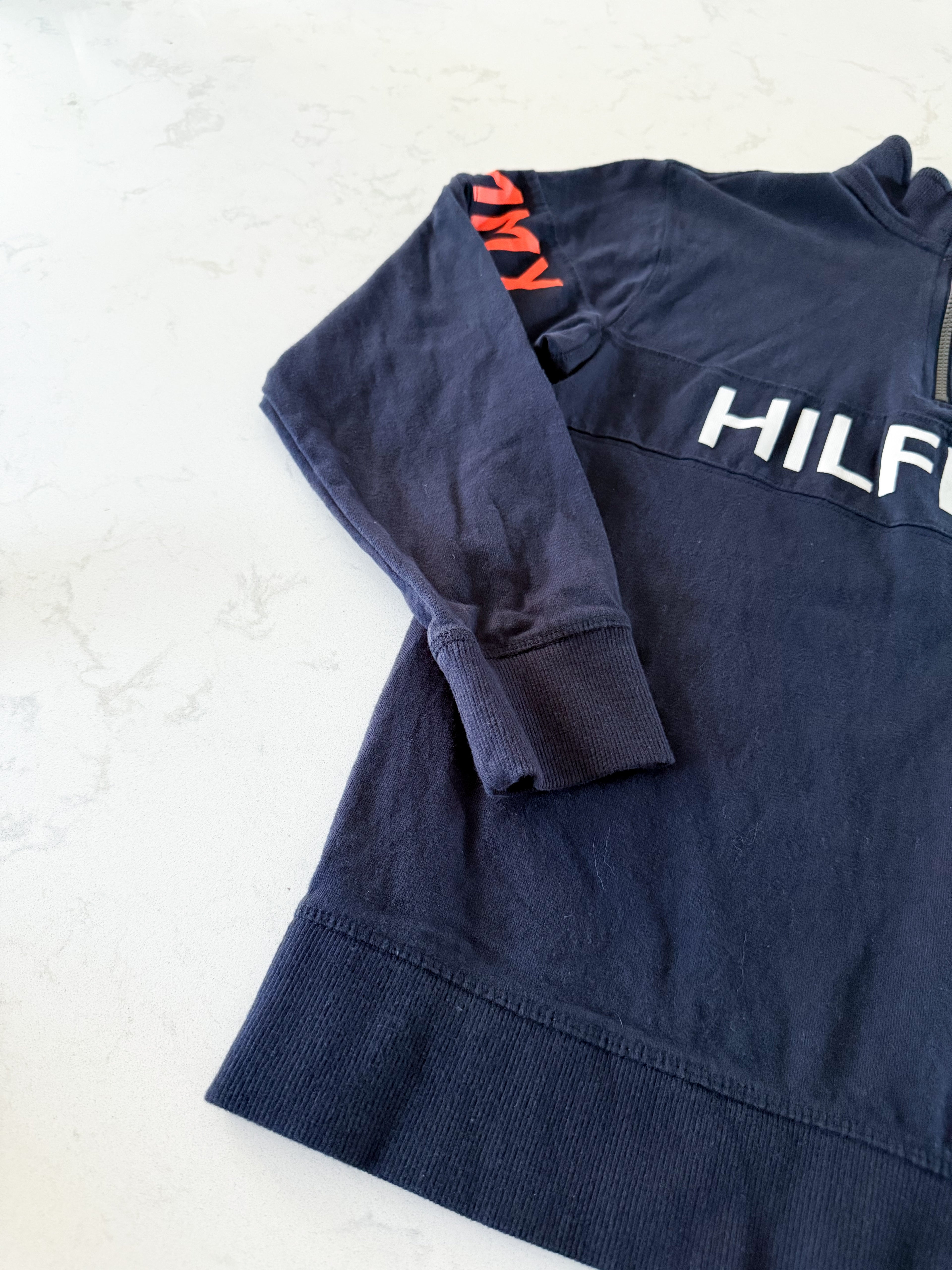 Tommy Hilfiger- 16-18Y- GUC- navy blue quarter zip with orange accents