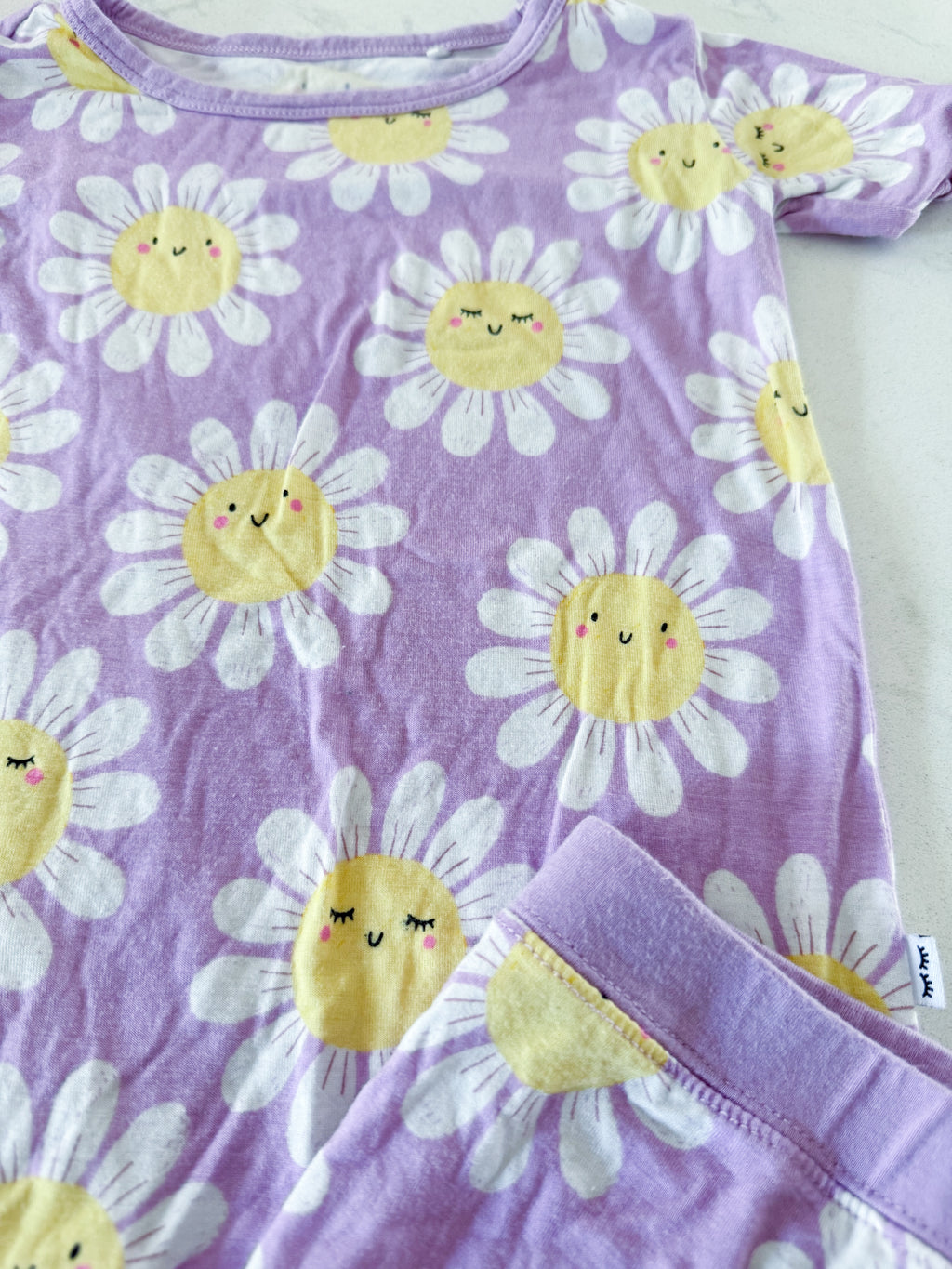Little Sleepies- 2T- GUC- light purple two piece bamboo Jammies with shorts and short sleeve shirt with daisy patterns