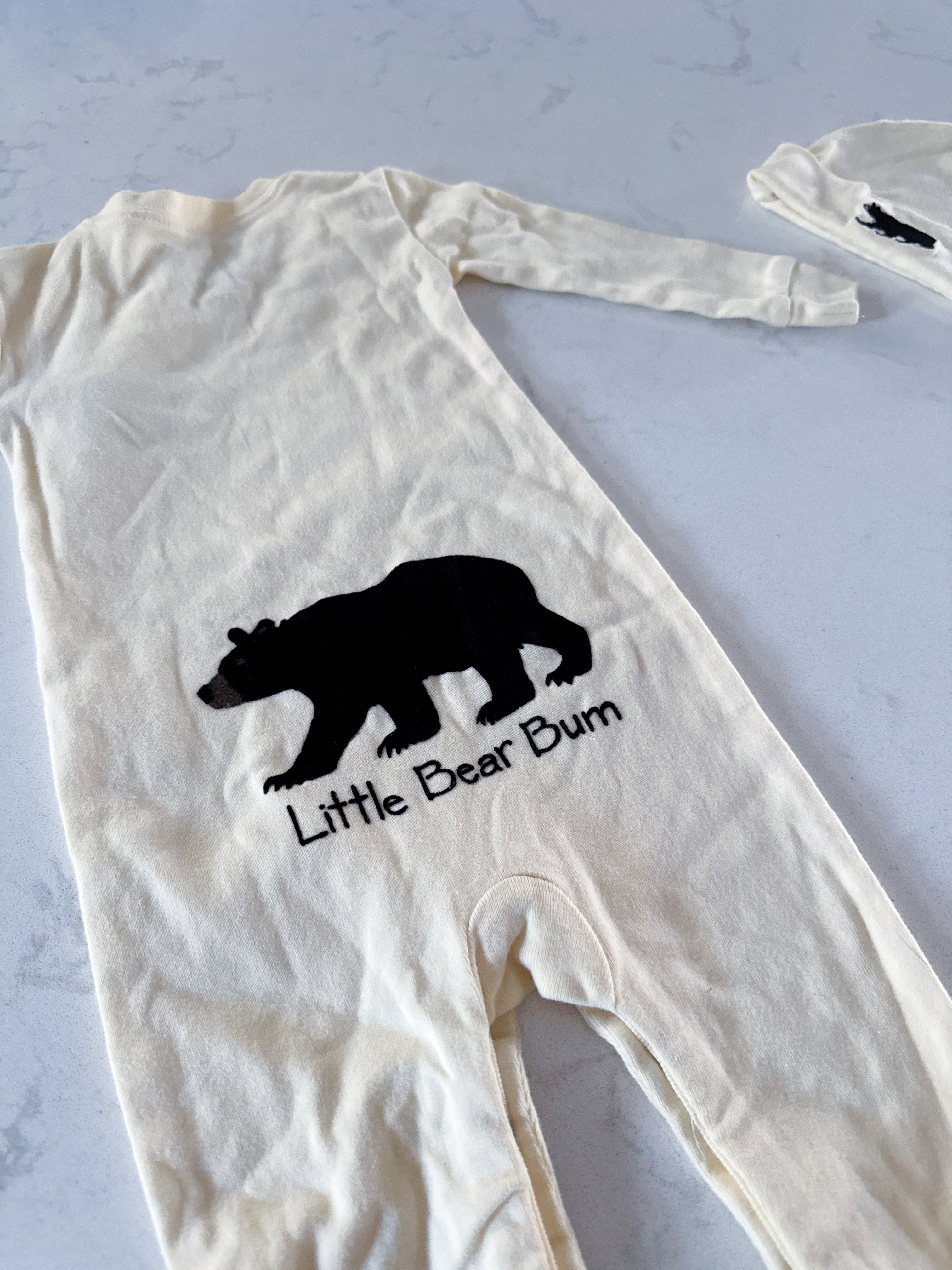 Little Blue House- 6-12m- GUC- creamy yellow footless pajamas with black bear embroidery