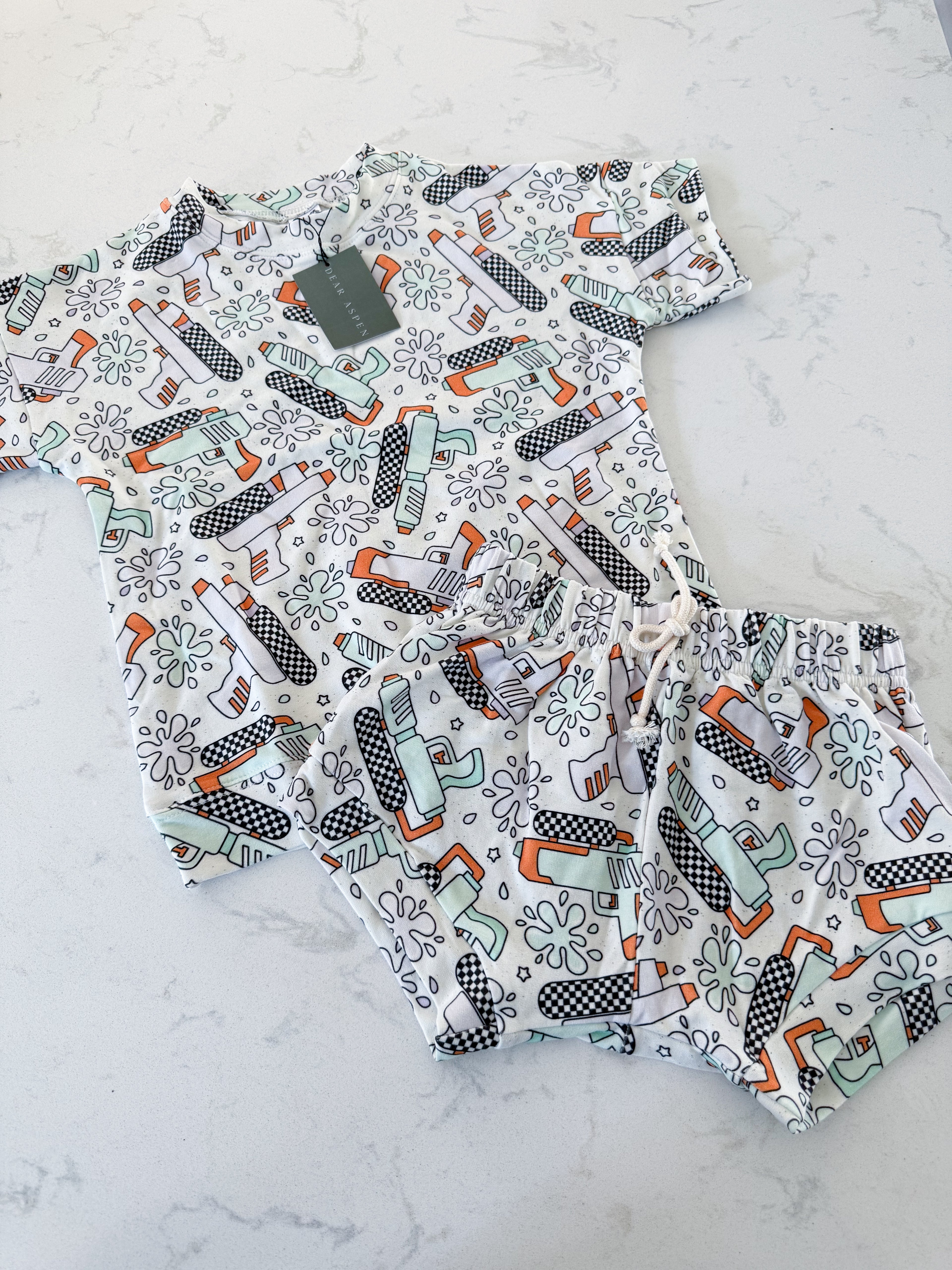 Dear Aspen- 6/7Y- BNWT- two piece set with water gun graphics
