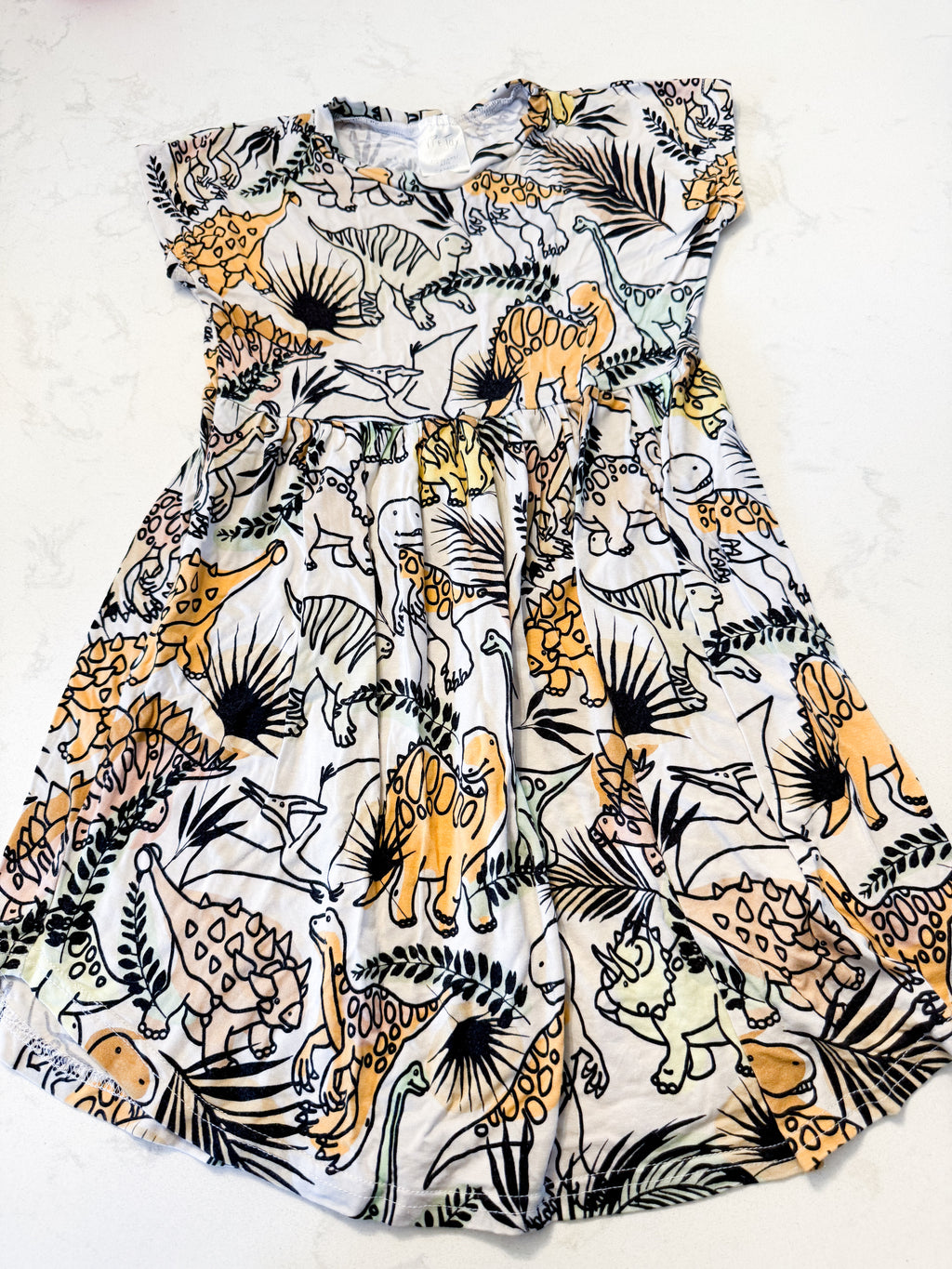 Vi and Jax- 4-5Y- VGUC- beige short sleeved bamboo dress with dinosaur pattern