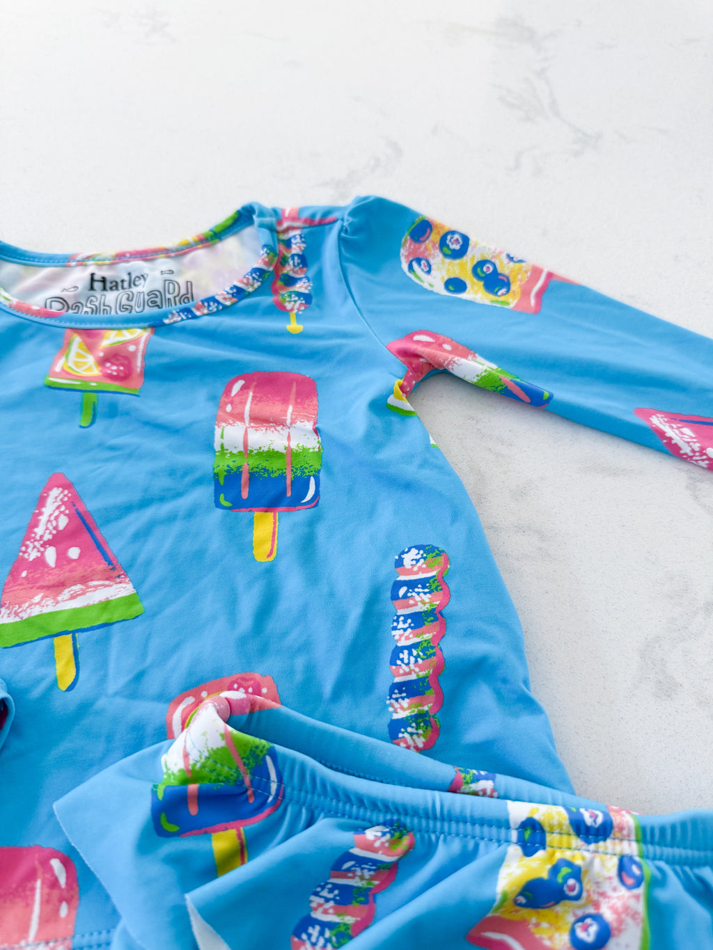 Hatley- 9-12m- VGUC- bright blue two piece swim suit with long sleeve top and bottoms