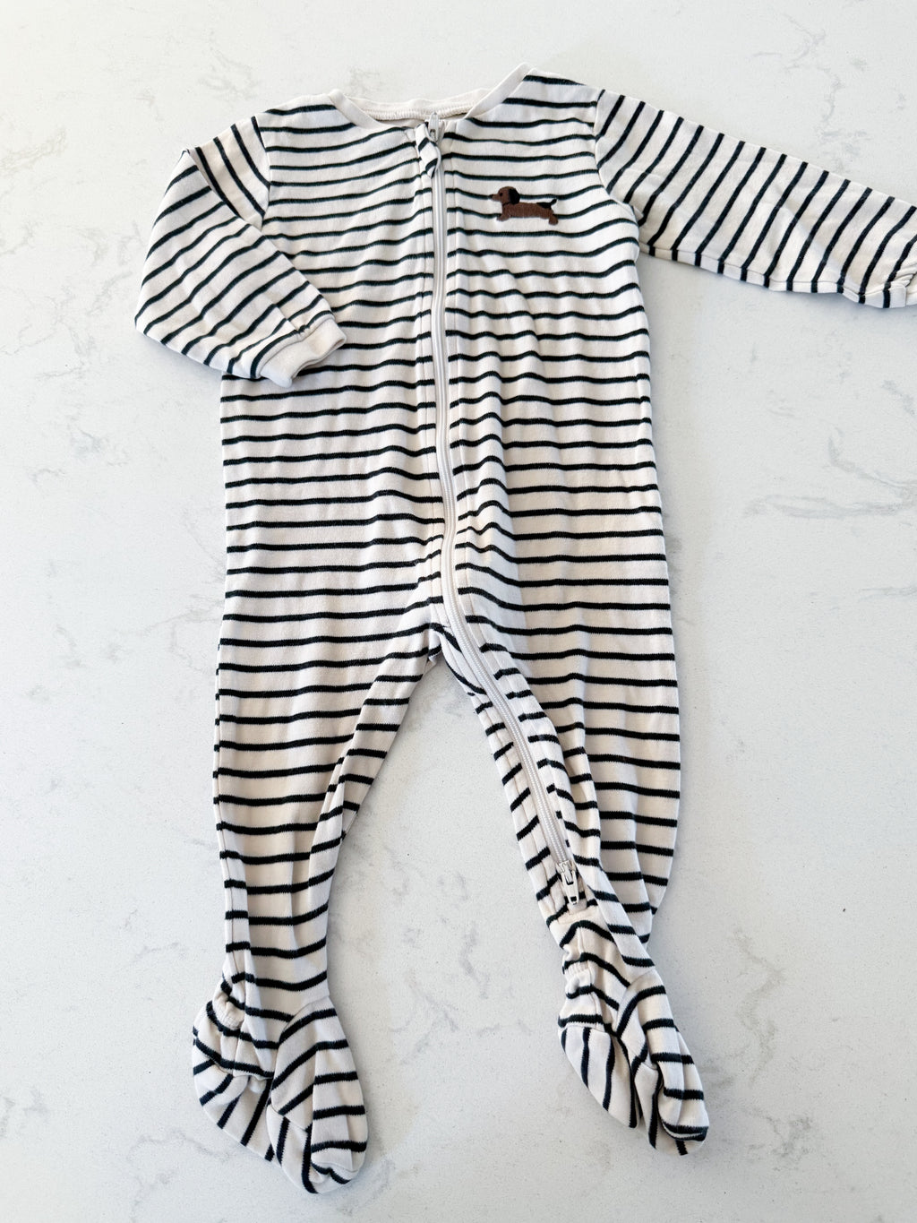 Pekkle- 9m- GUC- cream and black striped footie pajamas with wiener dog