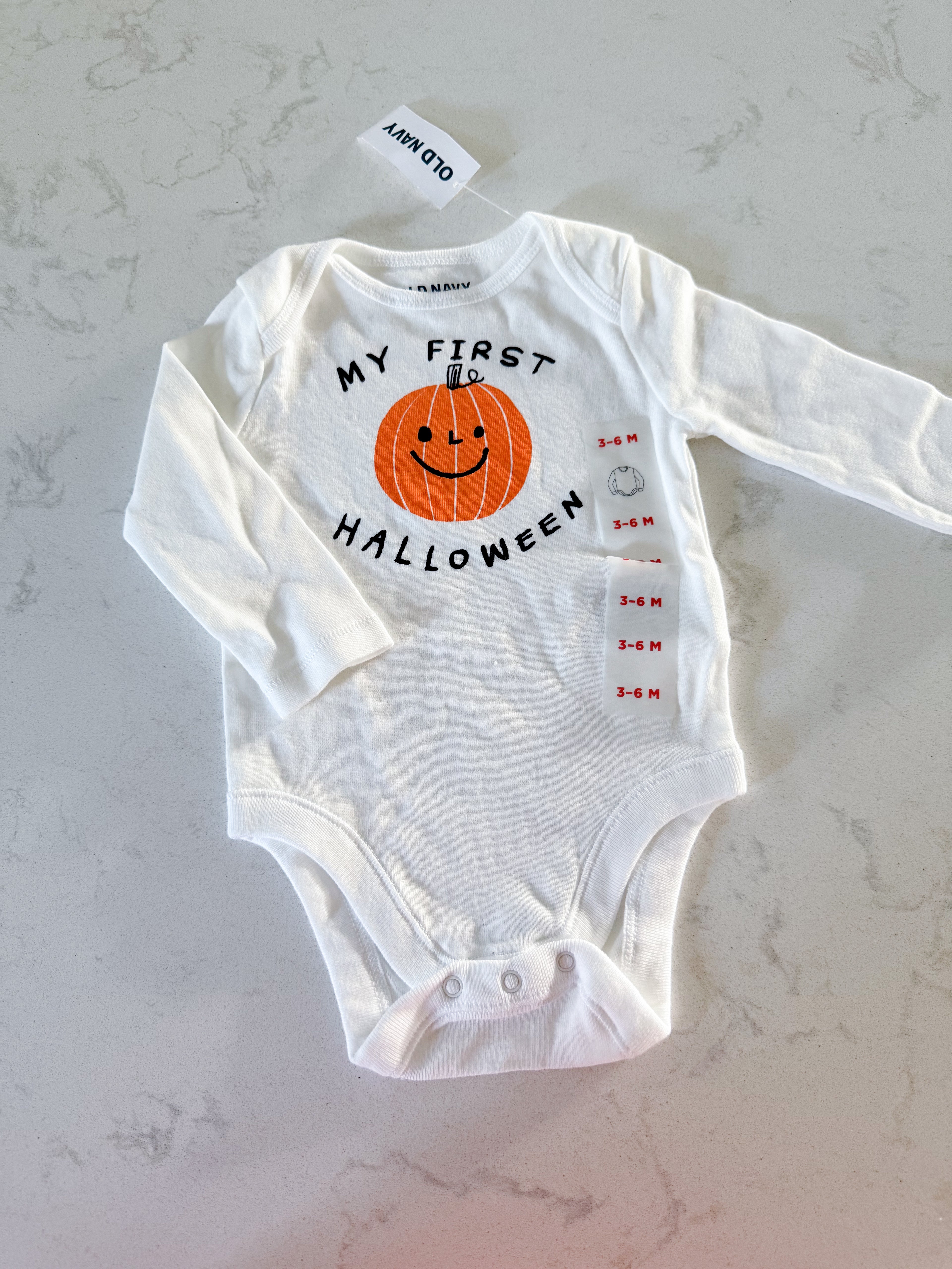 Old Navy-3-6m- BNWT- white long sleeve bodysuit with pumpkin on front