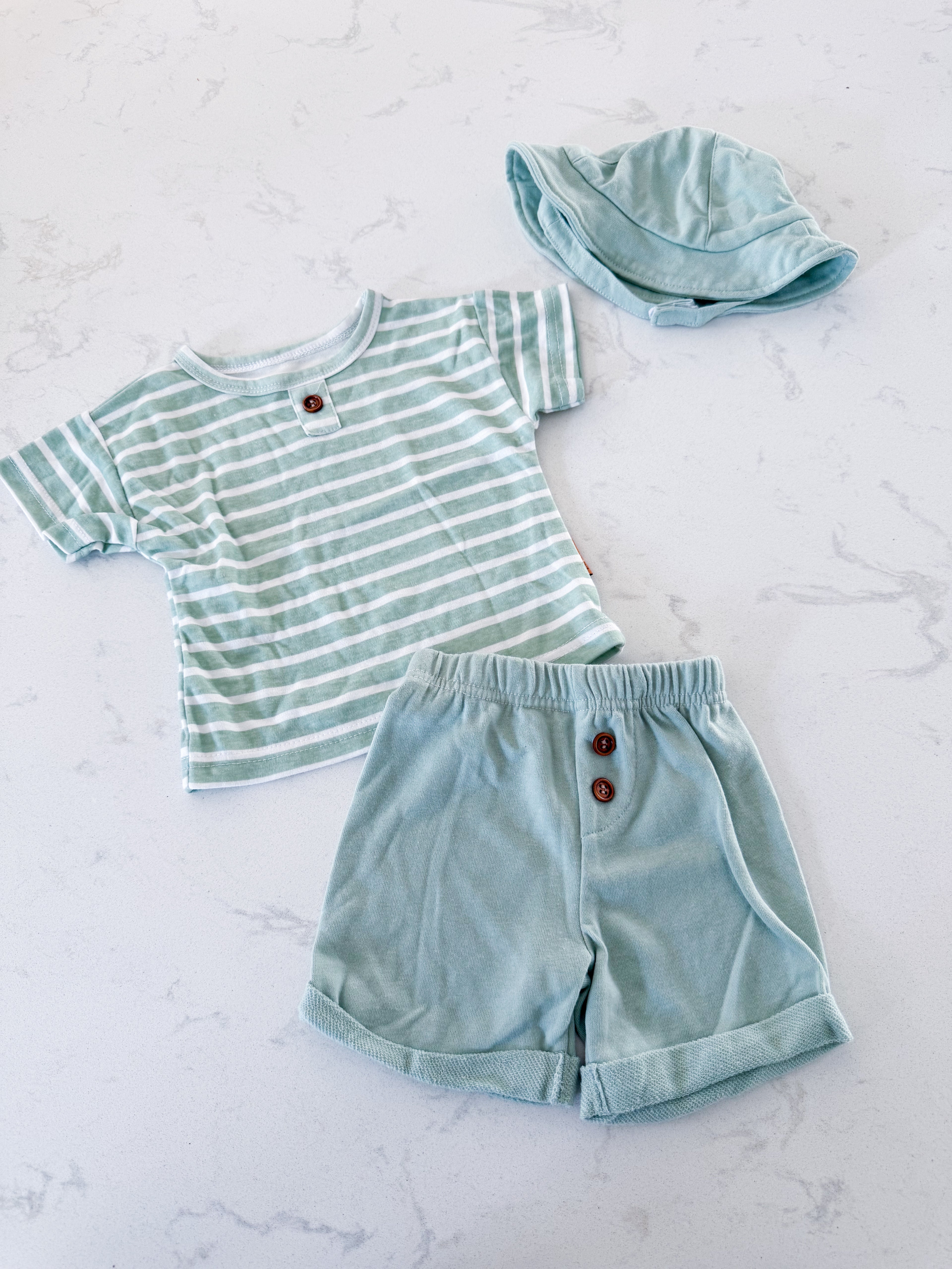 Lila and Jack- 6-9m- VGUC- green and white striped set with solid hat and shorts