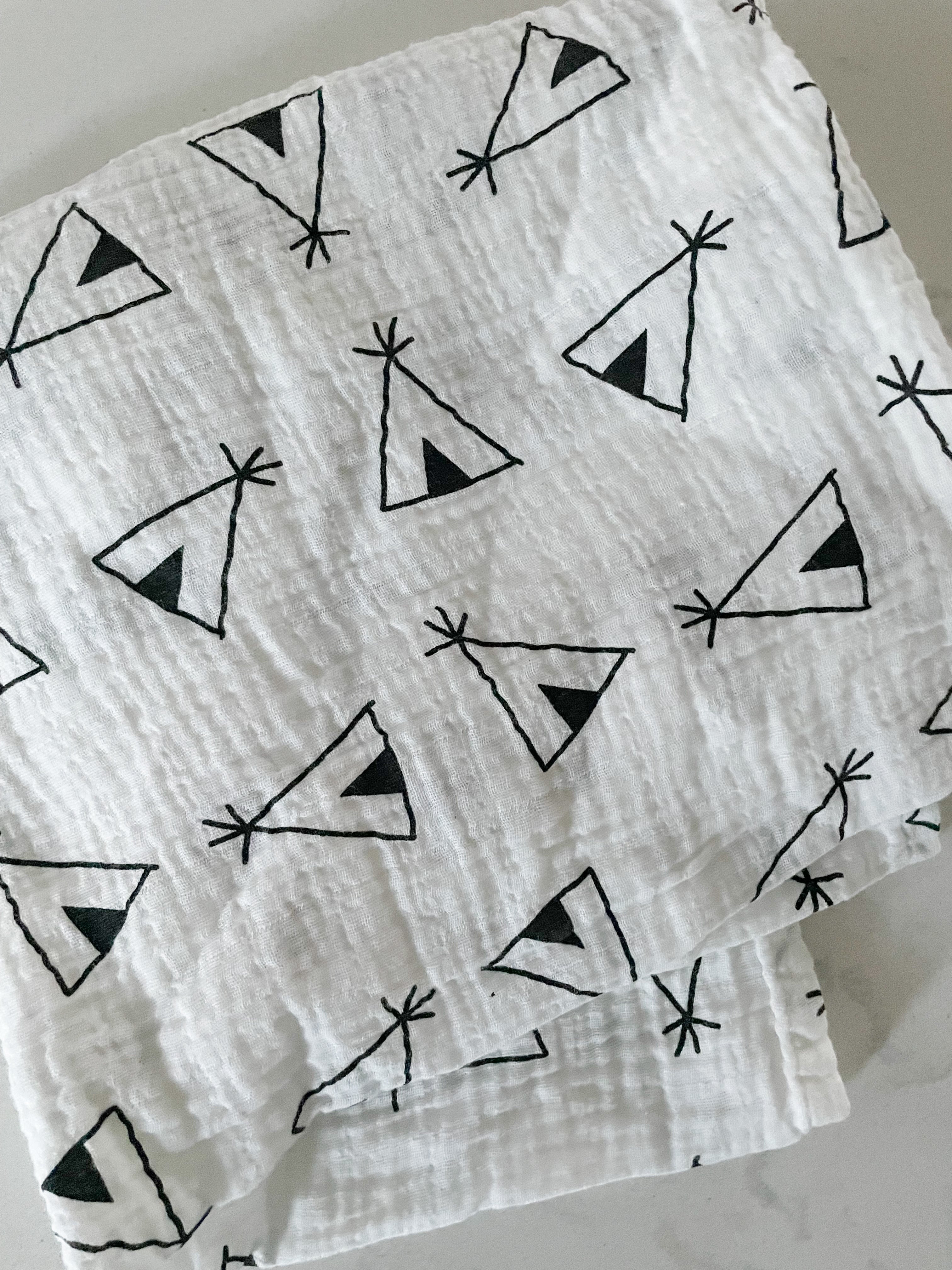 No brand- white muslin swaddle blanket with tee pees