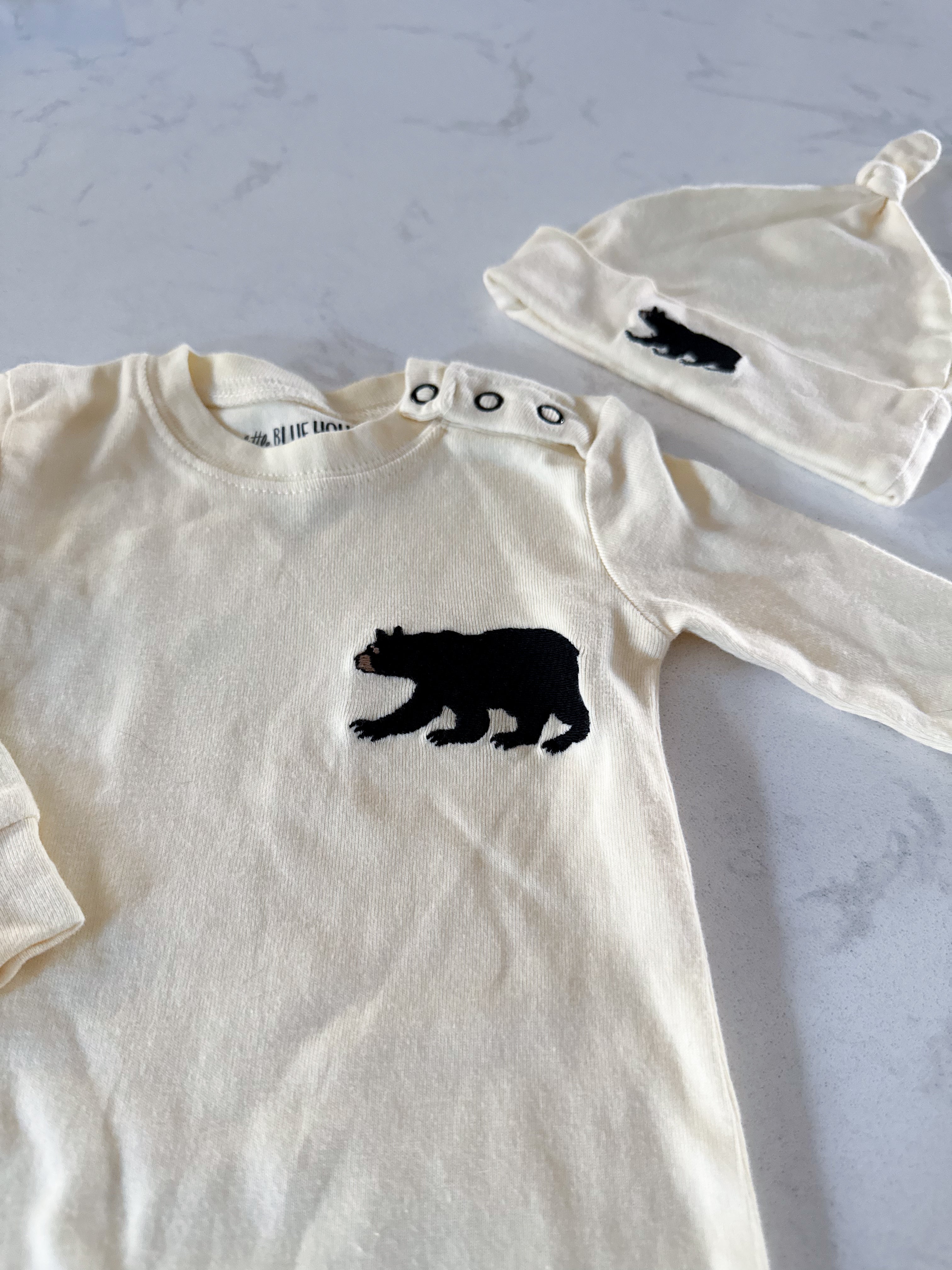Little Blue House- 6-12m- GUC- creamy yellow footless pajamas with black bear embroidery