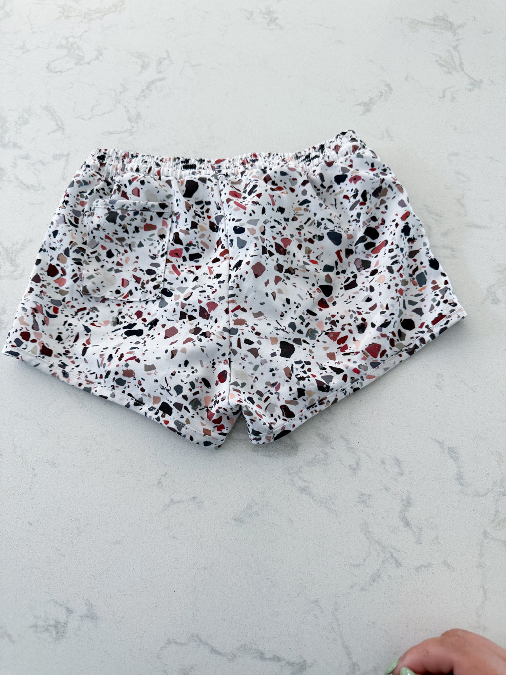 Current Tyed- 6/7Y- VGUC- white European style swim trunks (boardies) with pebble pattern
