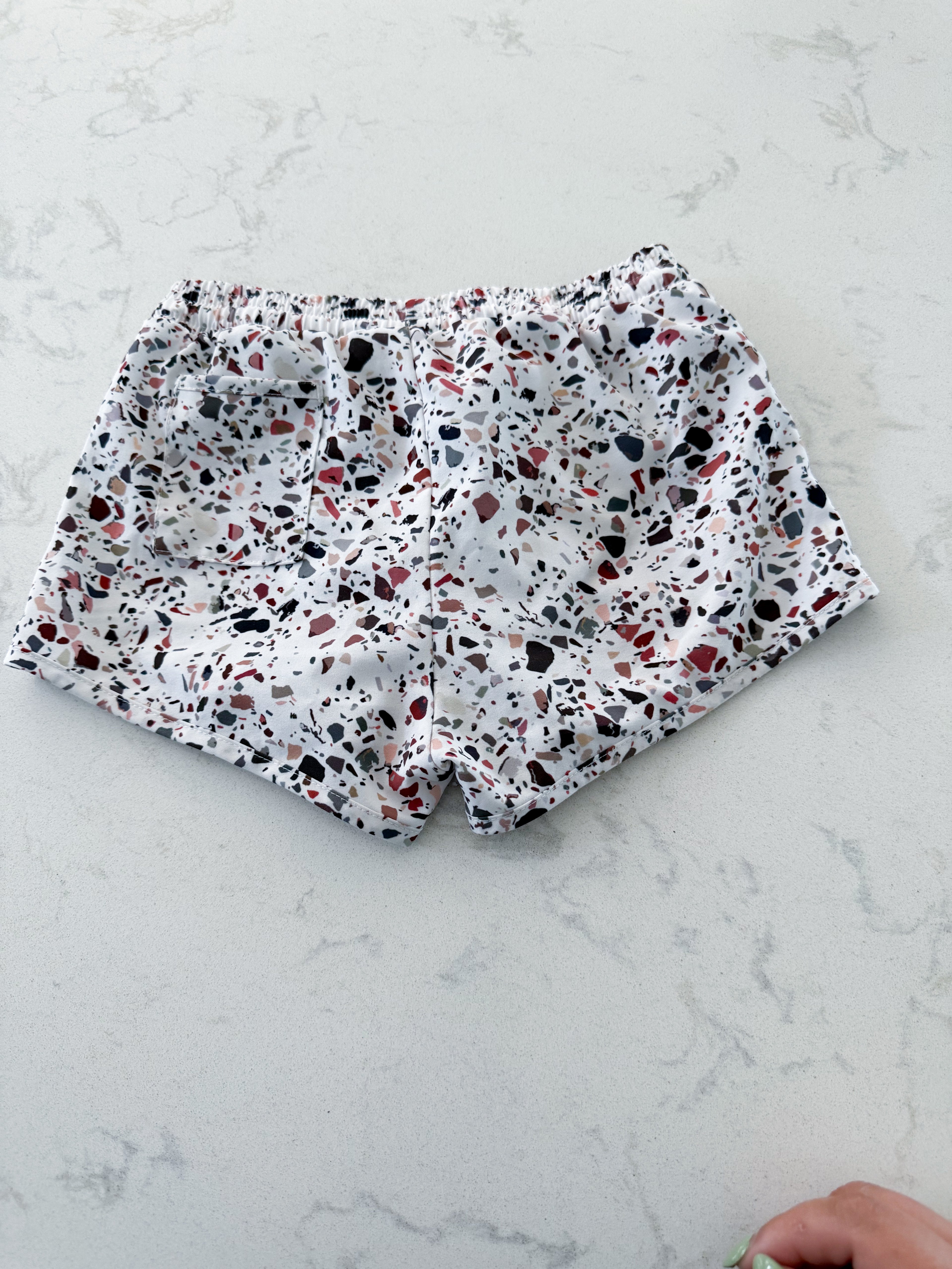 Current Tyed- 6/7Y- VGUC- white European style swim trunks (boardies) with pebble pattern