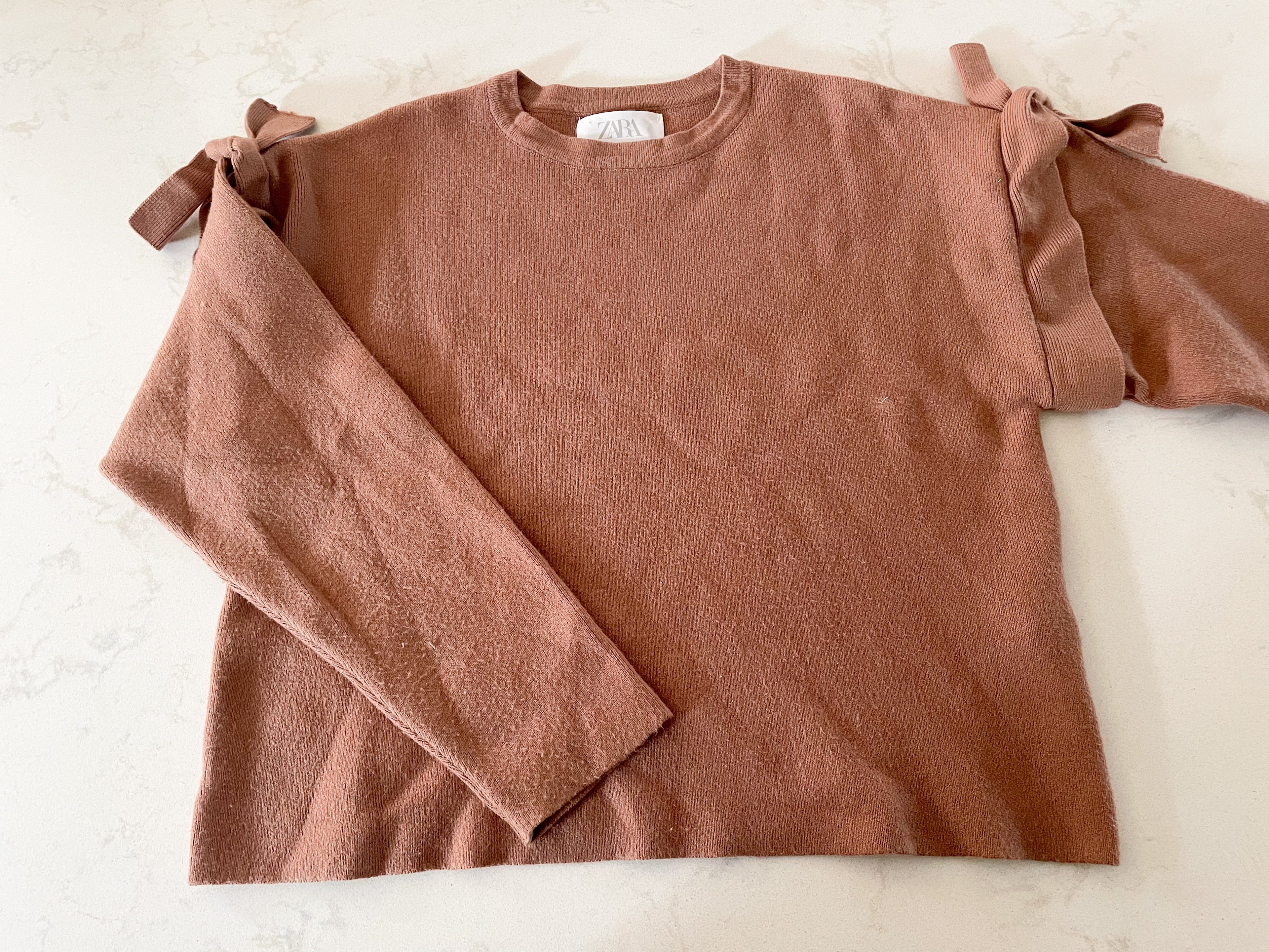 Zara-11-12Y-GUC- brown knit sweater with bows on shoulder