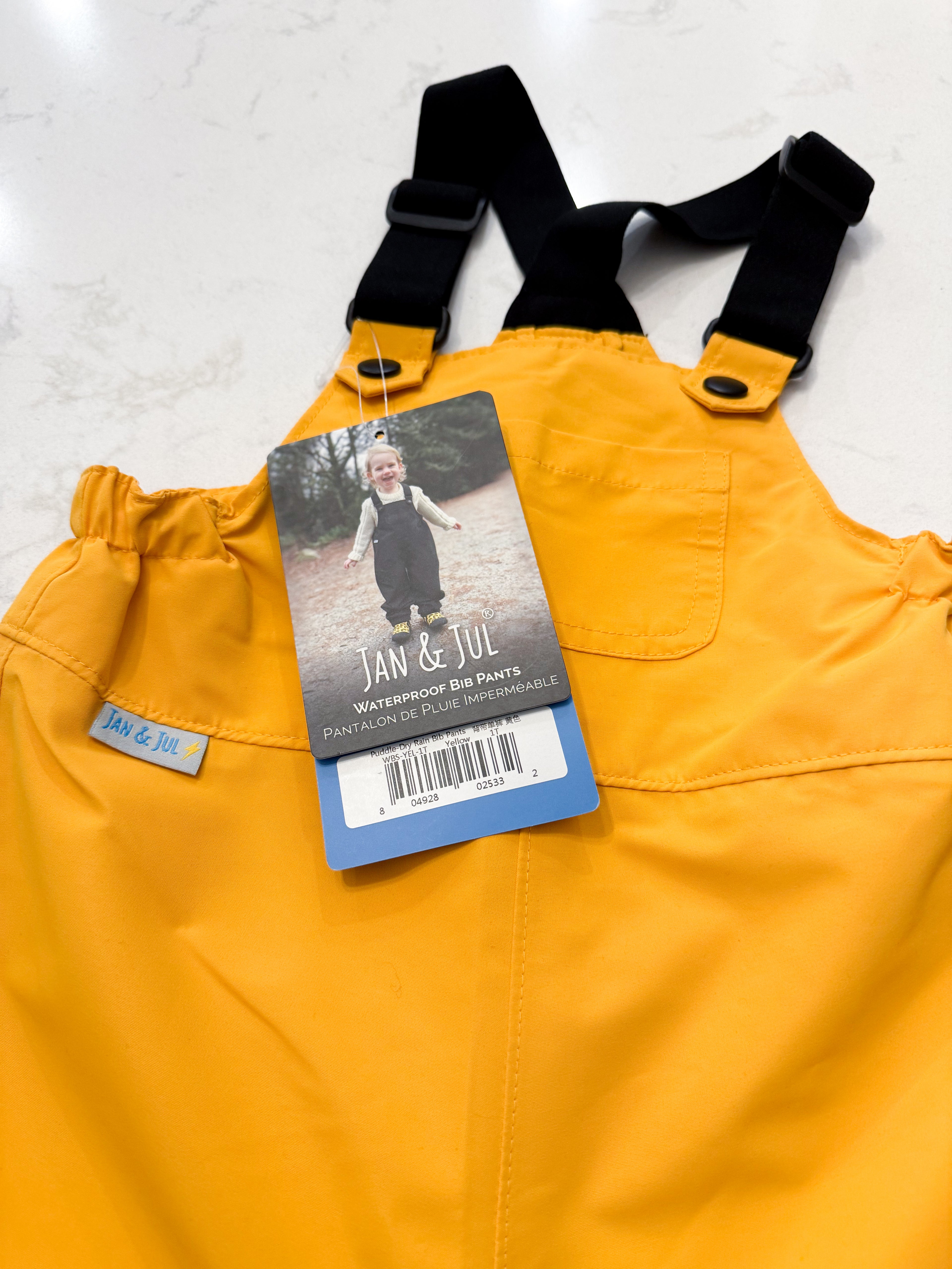 Jan and Jul- 1Y(fits 12-18m)- BNWT- yellow rain pants with shoulder straps