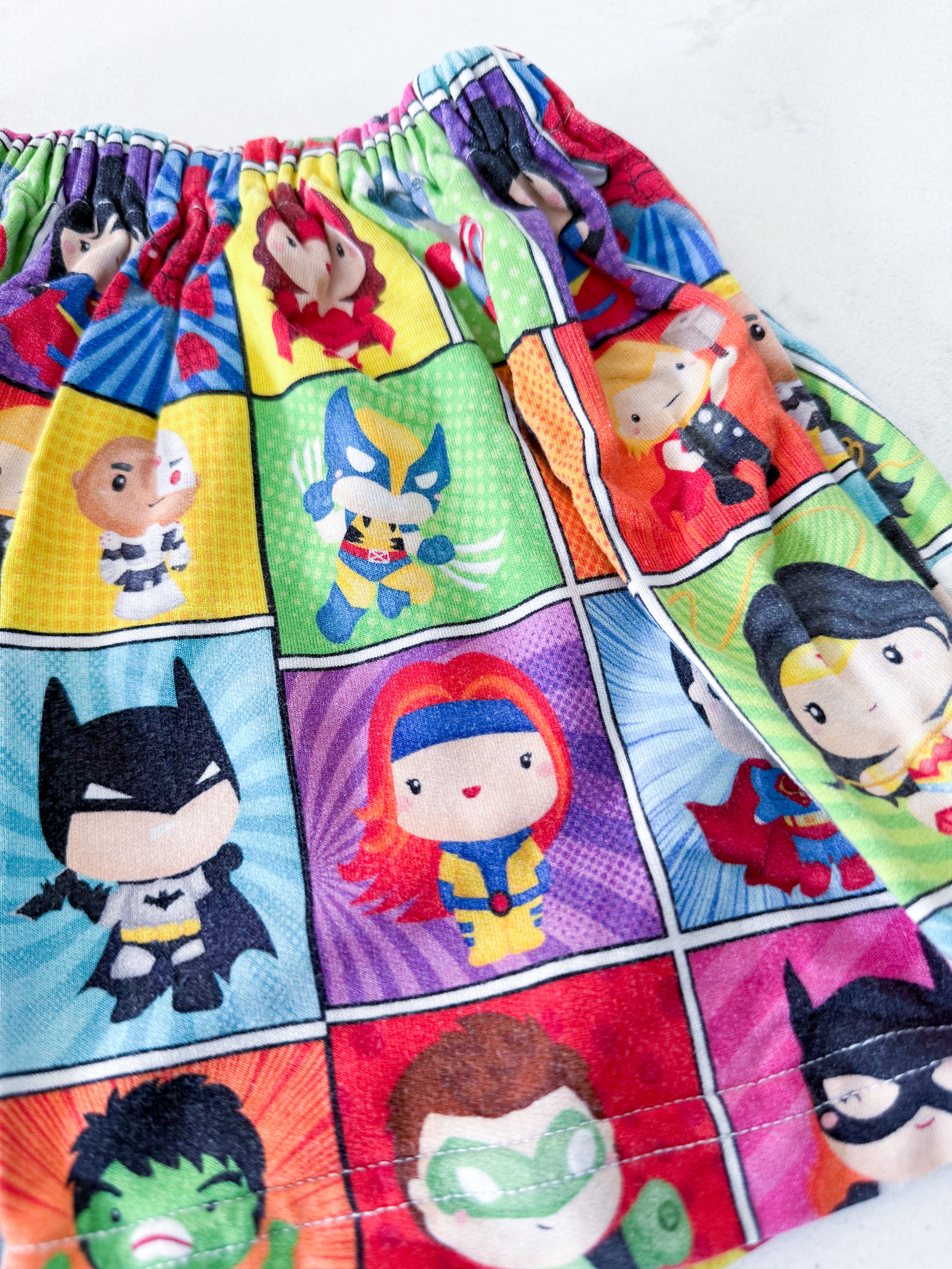 Vi and Jax- 18-24m- GUC- bamboo skirt with cartoon superhero graphics