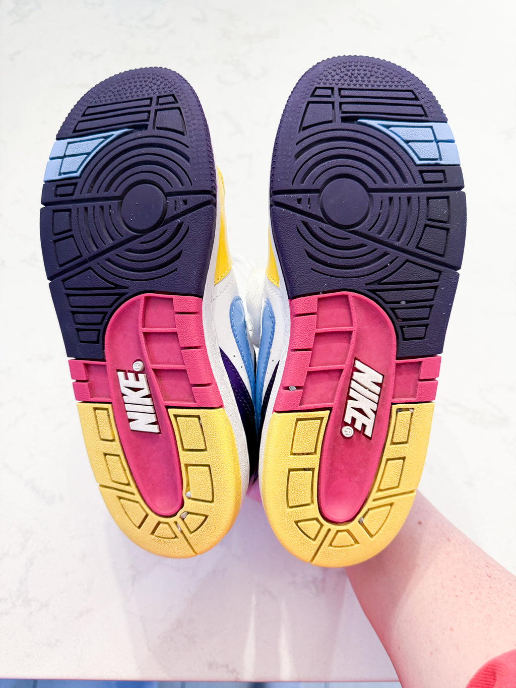 Nike- 4Y- GUC- White pink purple yellow and blue shoes with laces