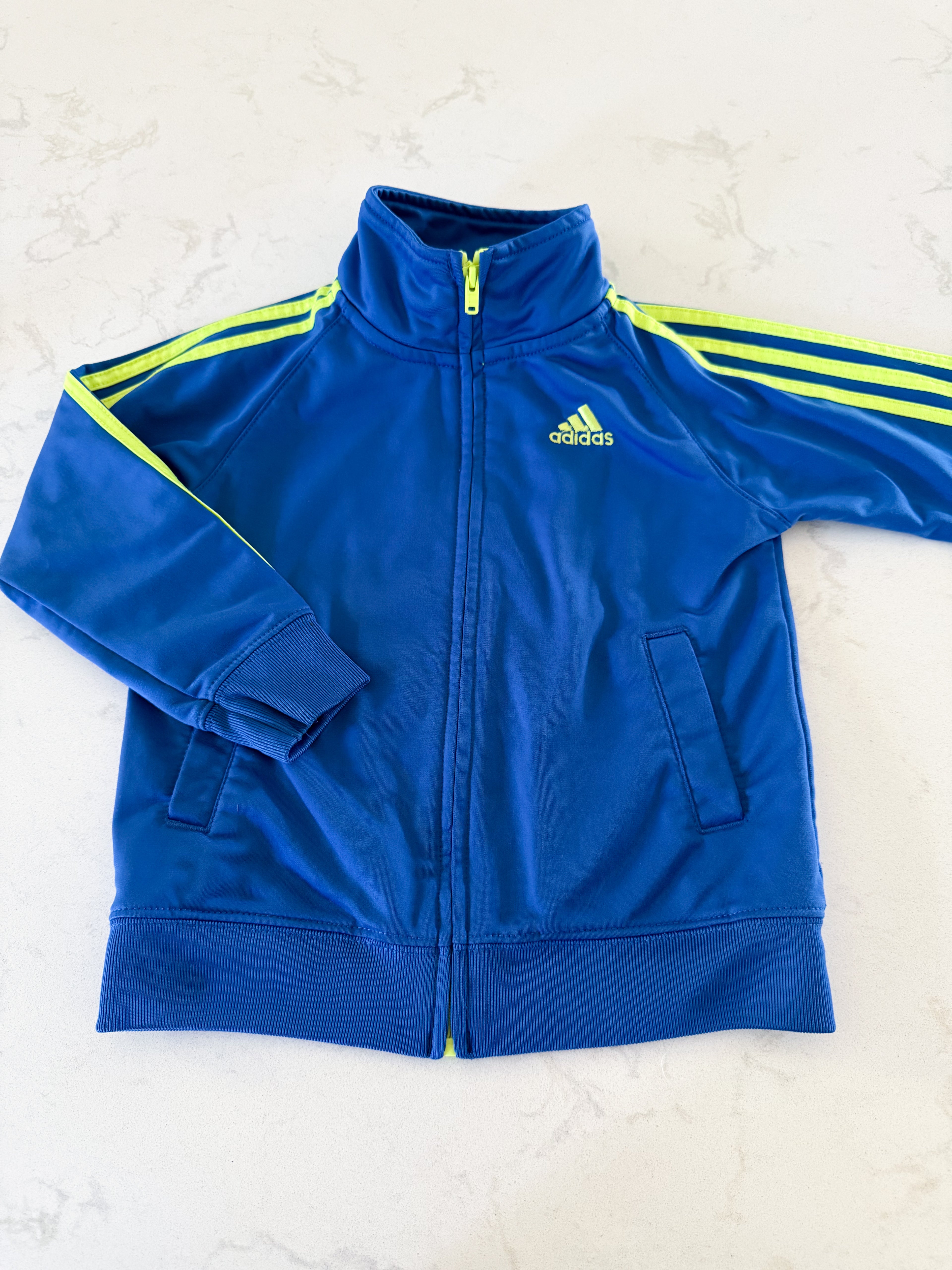 Adidas-2T-GUC-medium blue zip up with bright green stripes