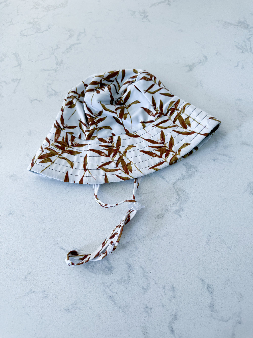 Little Bo- infant size- VGUC- white with brown leaves swim hat