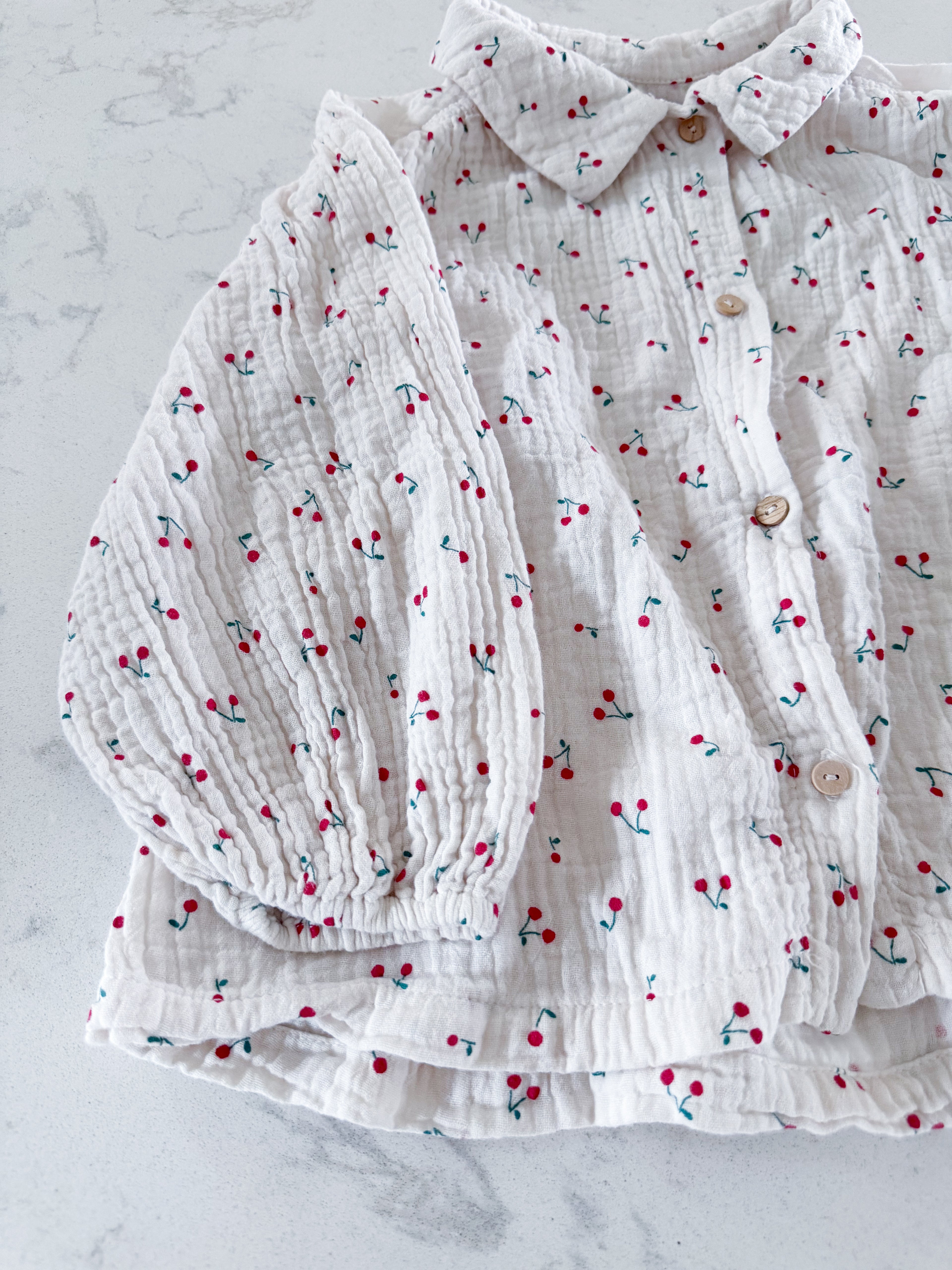 Zara- 4-5Y- VGUC- long sleeve muslin shirt with puffed sleeves and cherry patterns