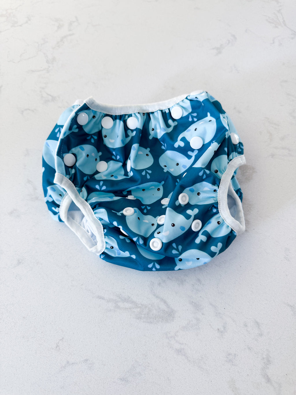 Alva Baby- size is adjustable- VGUC- reusable swim diaper with whale pattern