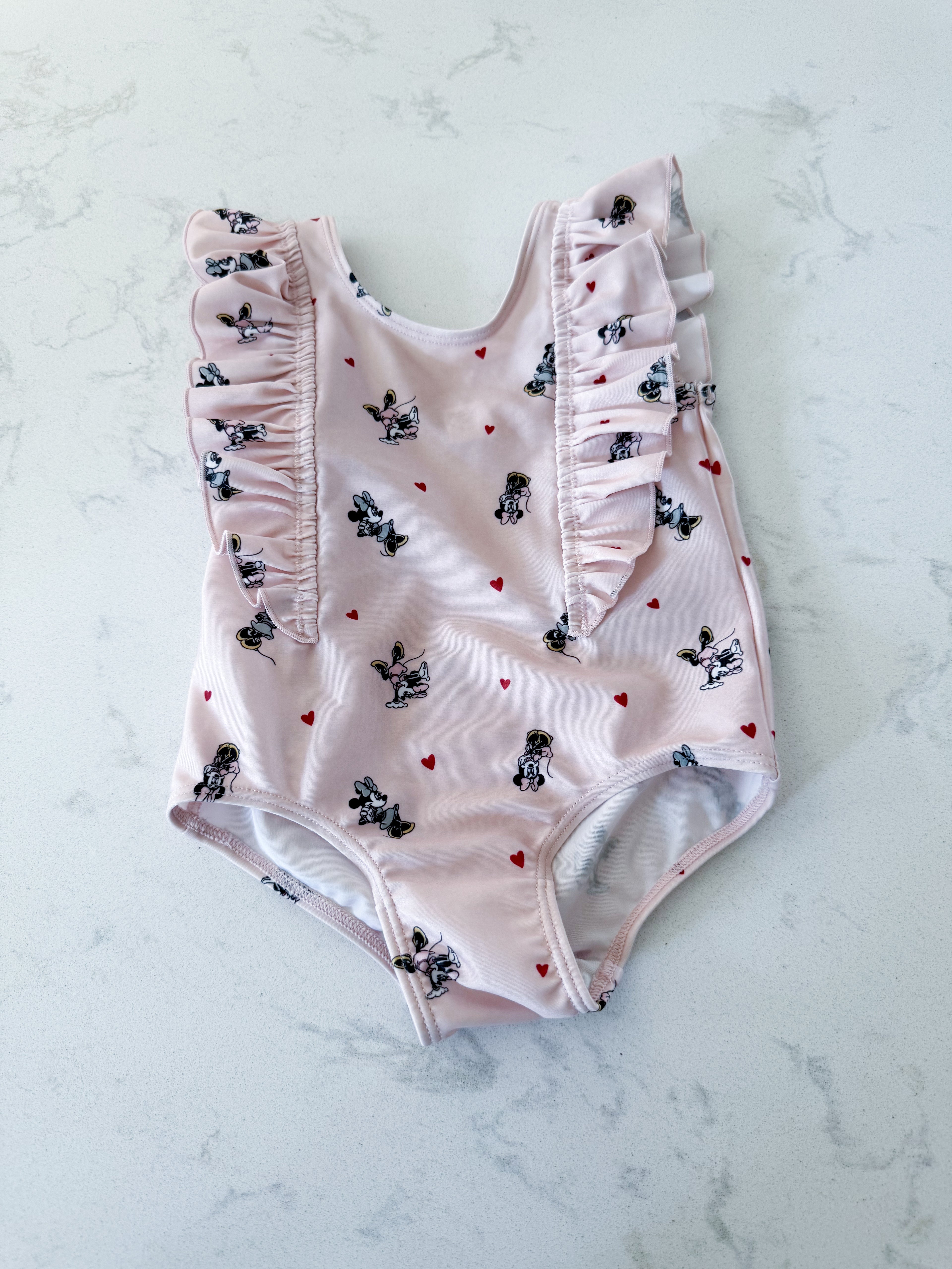 H&M- 9-12m- VGUC- light pink ruffle one piece swim suit with Minnie Mouse