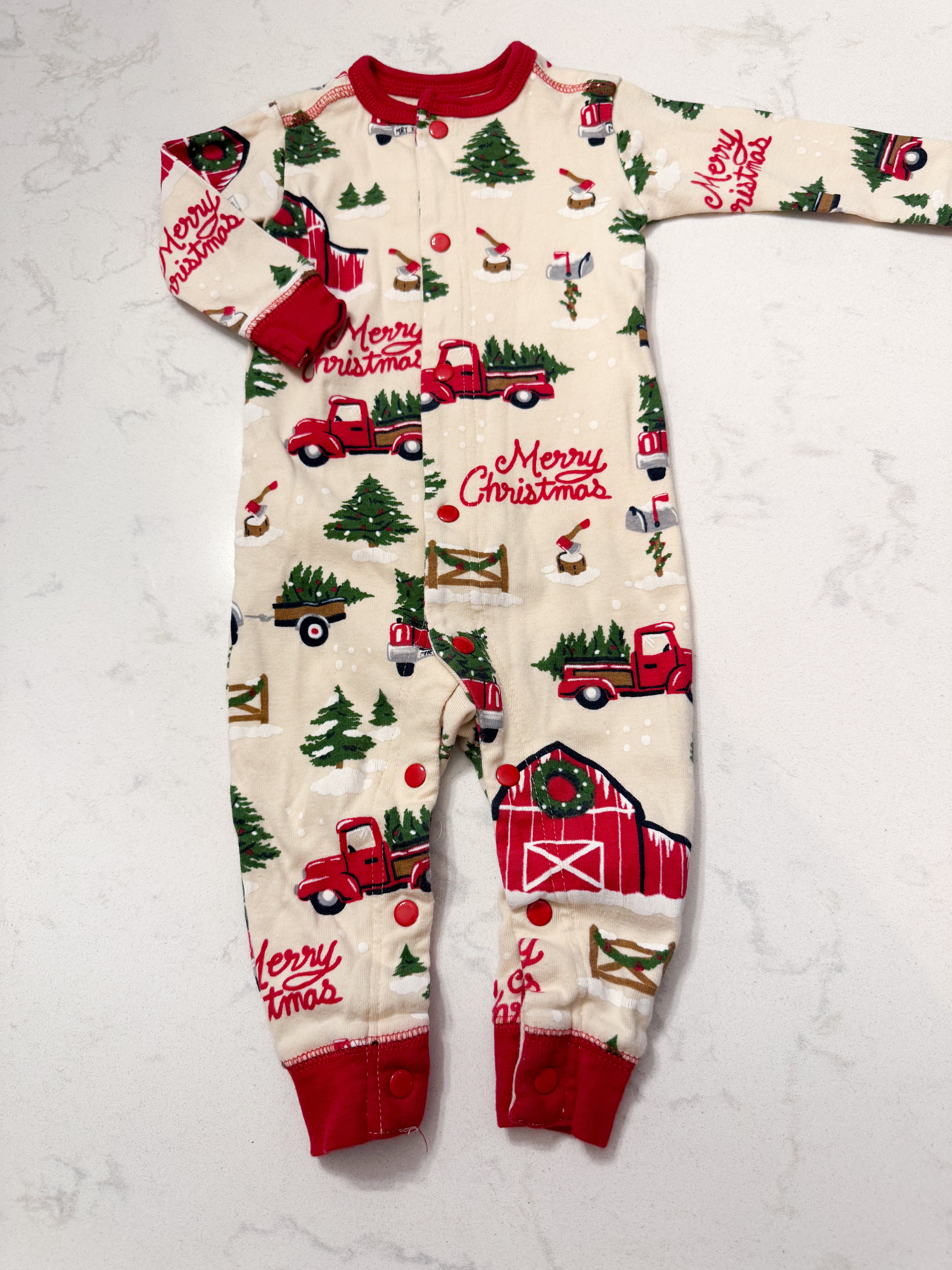 Little Blue House- 3-6m- VGUC- cream coloured button up pajamas with trucks