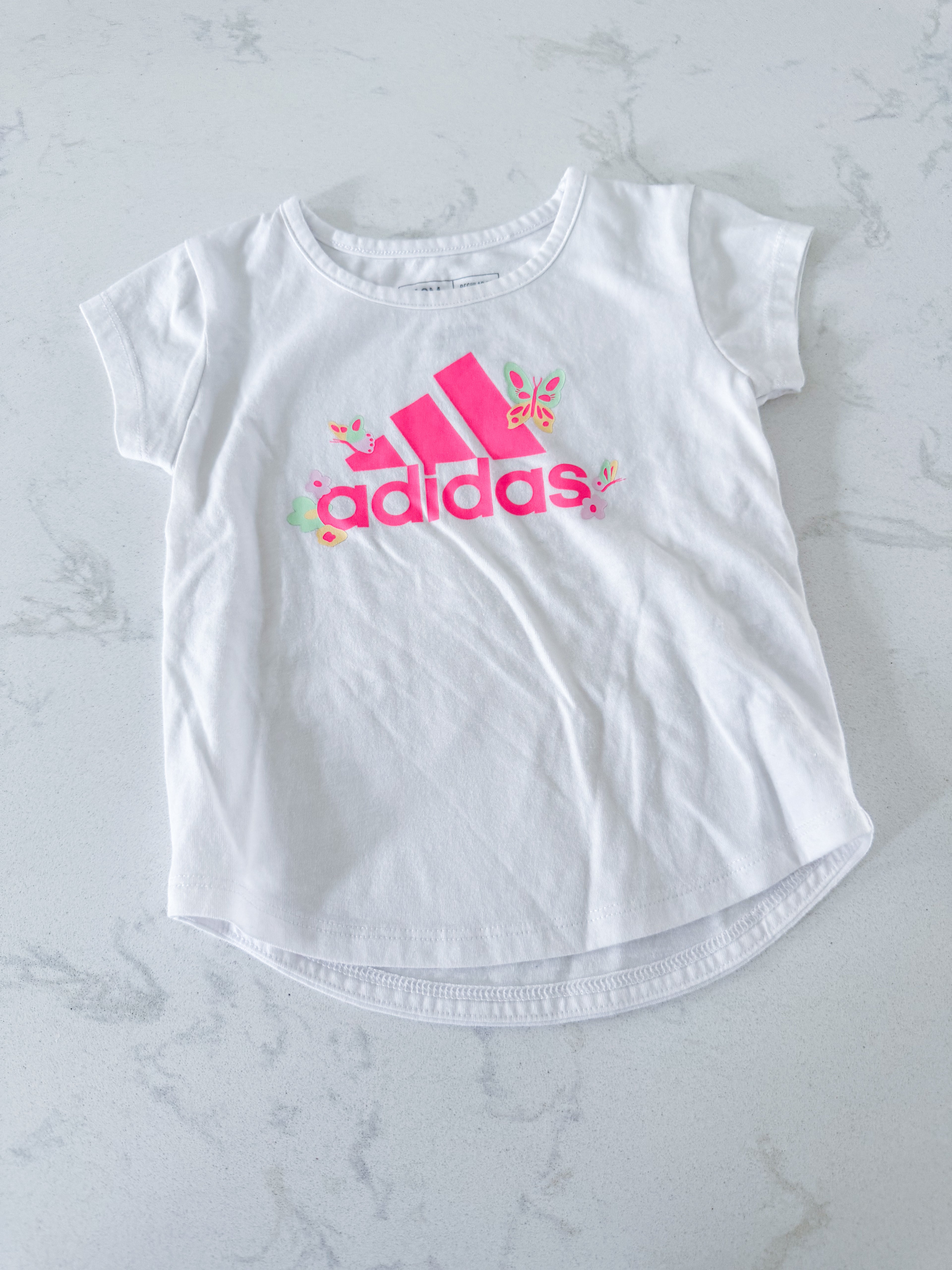 Adidas- 12m- VGUC- white t shirt with bright pink logo and butterflies