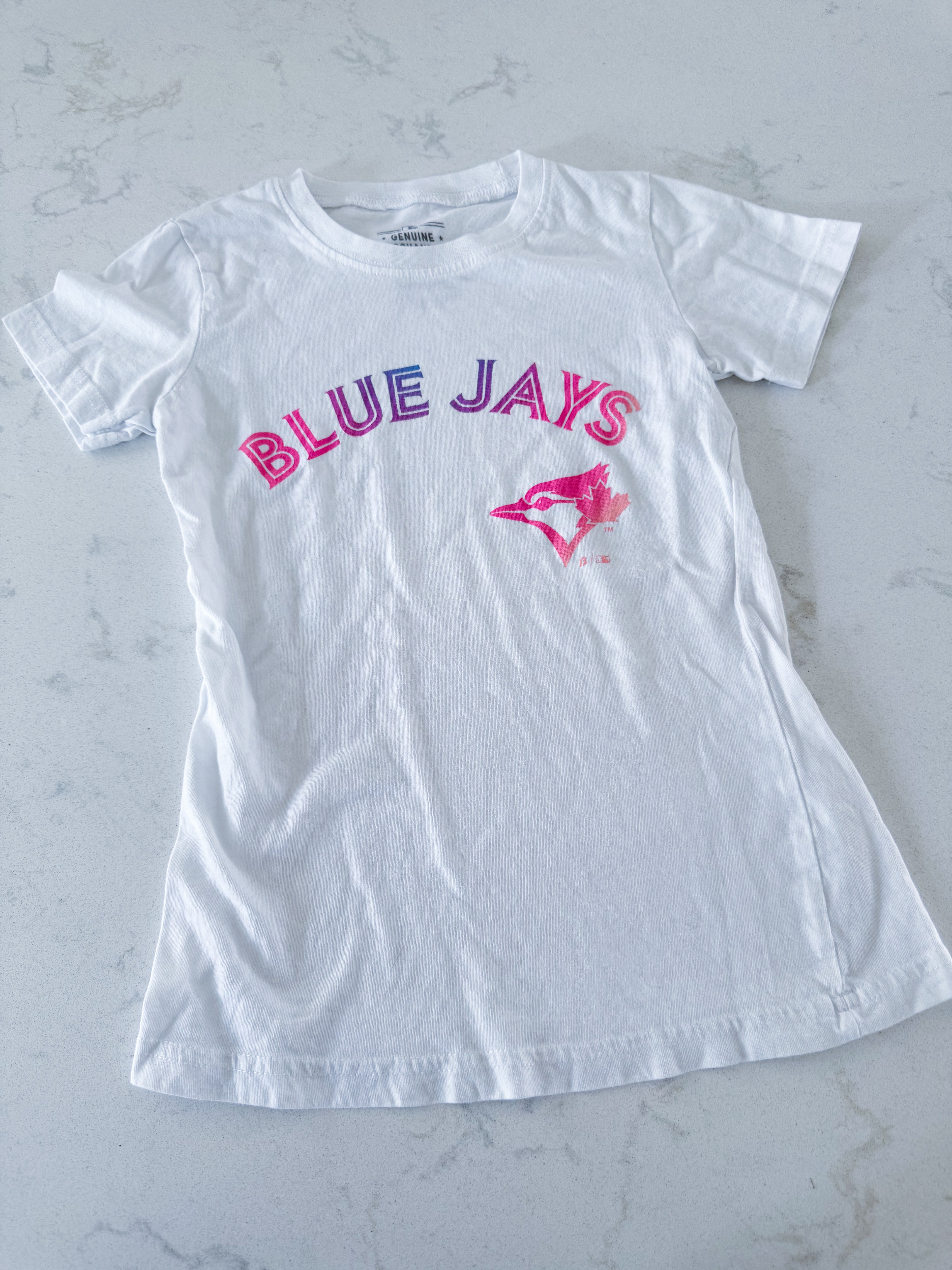 Genuine Merchandise- Small (6Y)- VGUC- white t shirt with neon blue jays logo