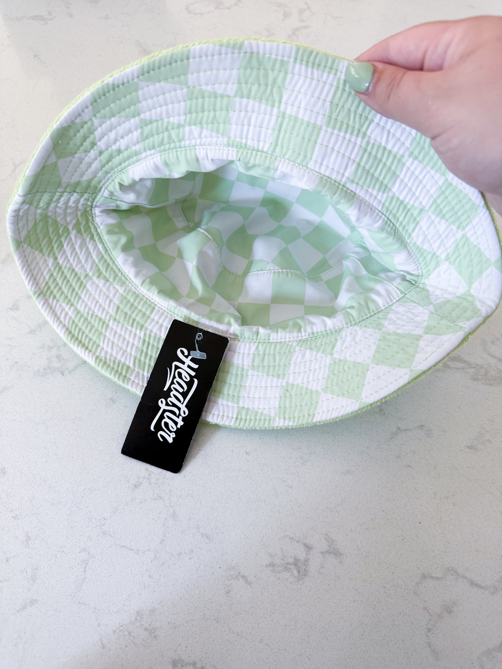 Headster- 52cm- BNWT- green checkered and Terry towel reversible hat