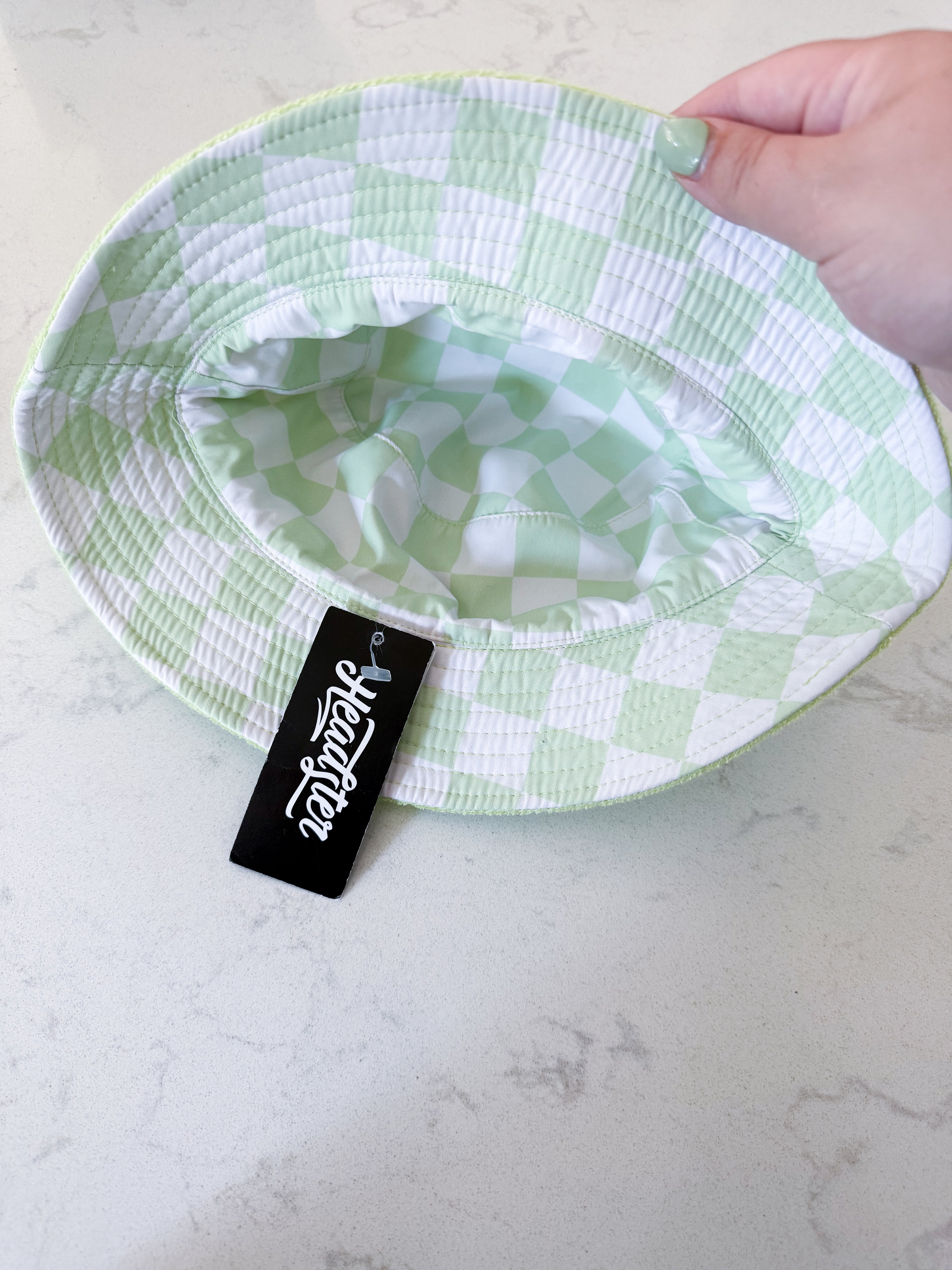 Headster- 52cm- BNWT- green checkered and Terry towel reversible hat