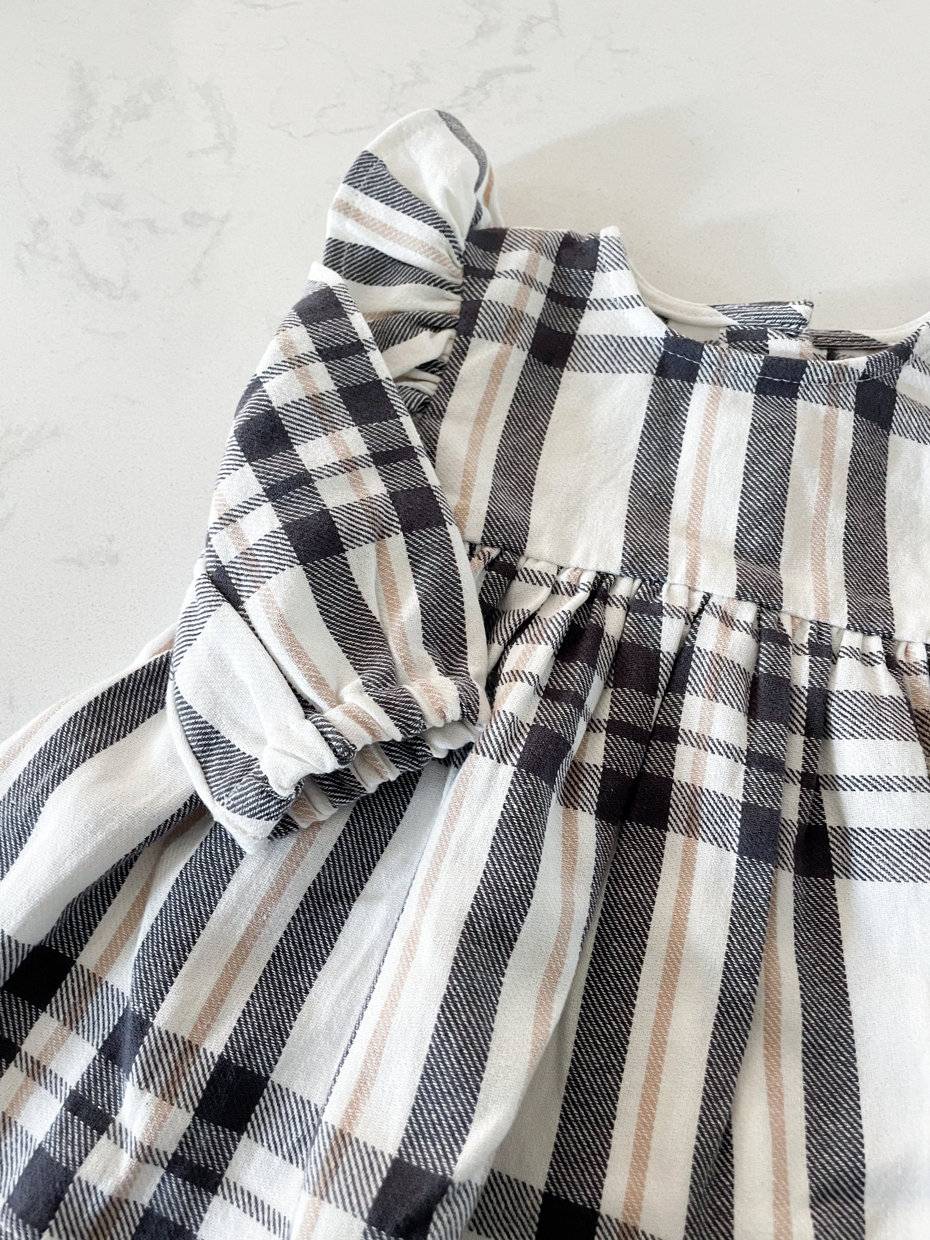 Rise Little Earthling-0-3m (fits big)- BNWT- cream black and beige plaid dress